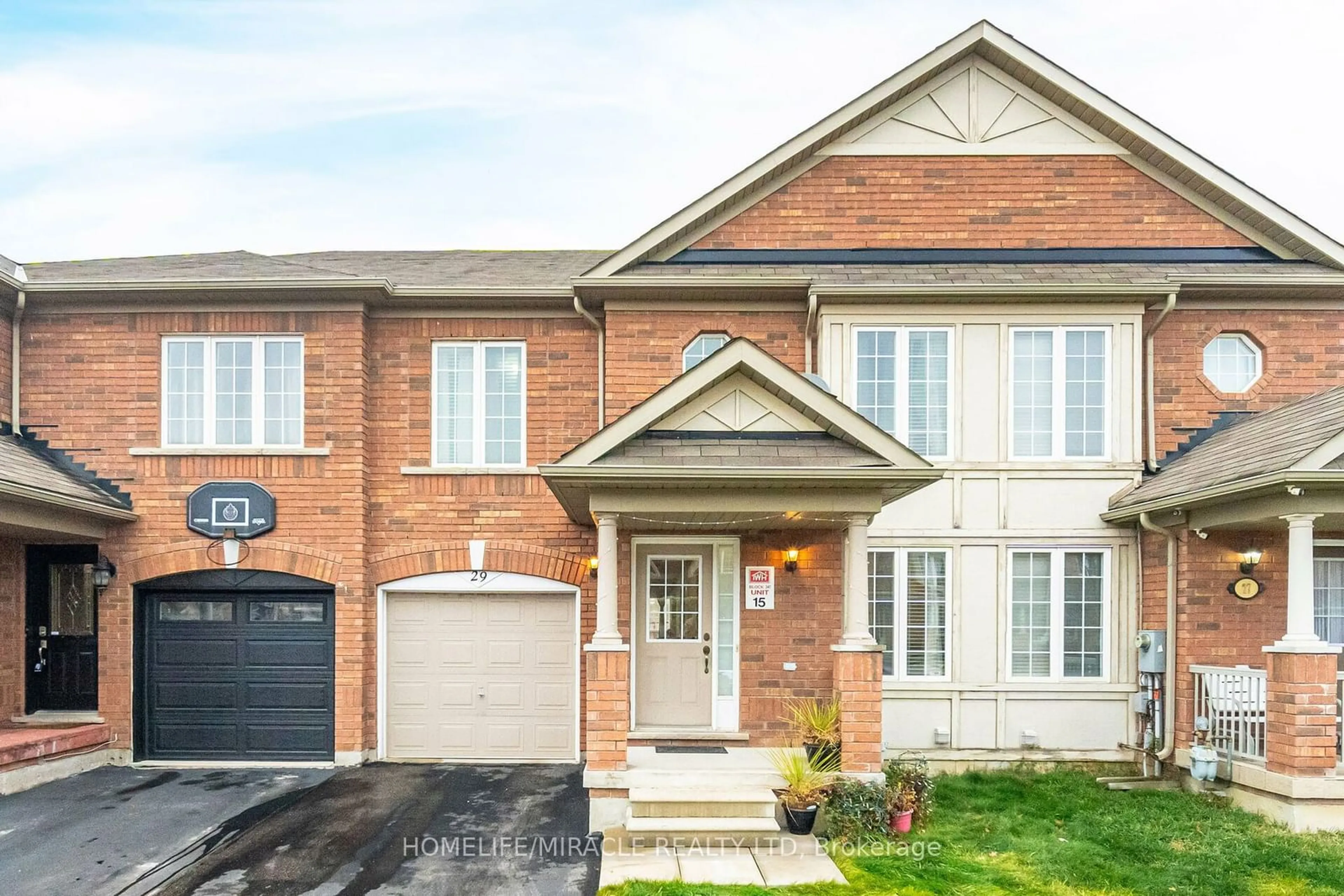 Home with brick exterior material, street for 29 Quailvalley Dr, Brampton Ontario L6R 0N4