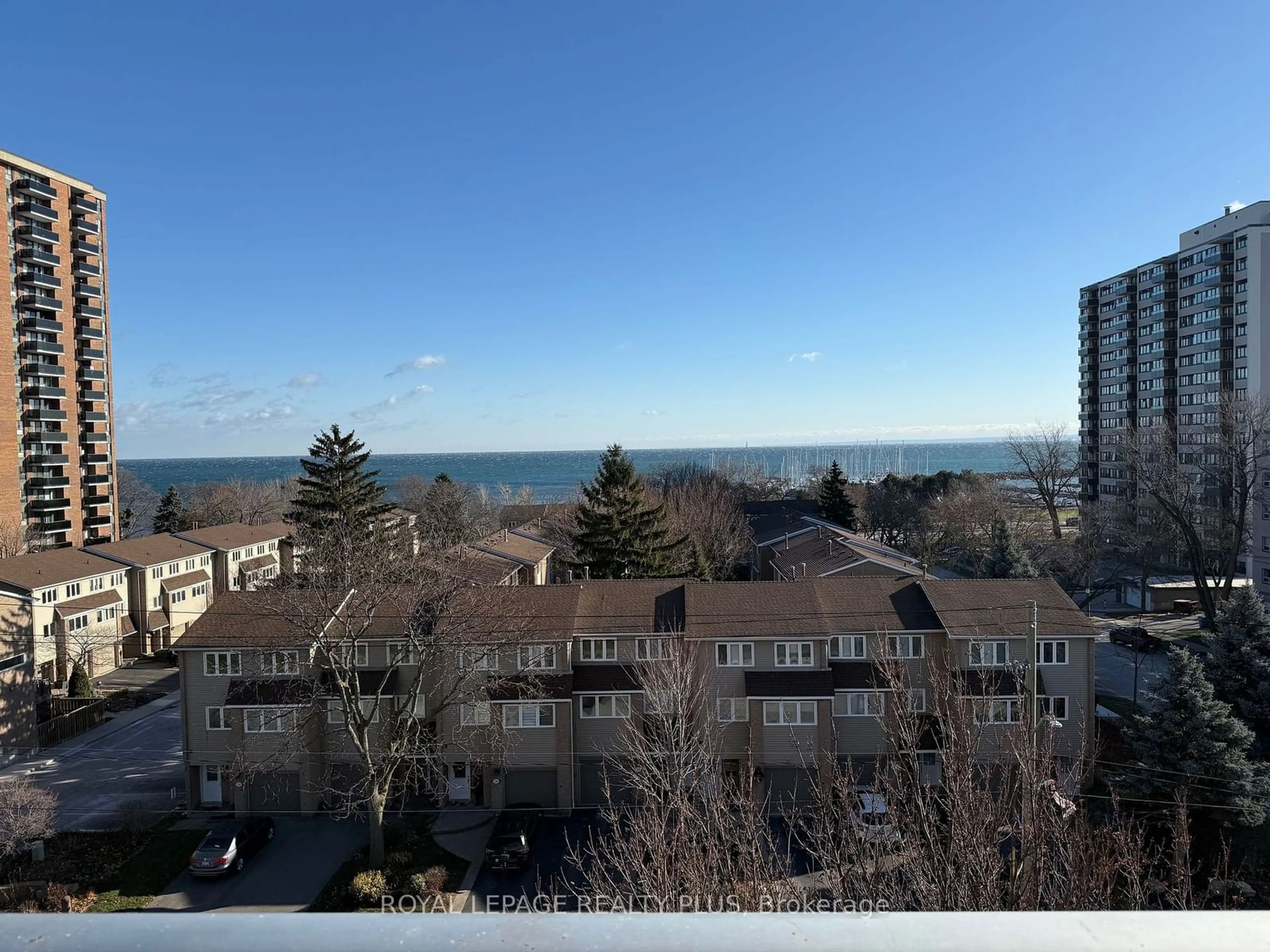 A pic from outside/outdoor area/front of a property/back of a property/a pic from drone, water/lake/river/ocean view for 2263 Marine Dr #607, Oakville Ontario L6L 5K1