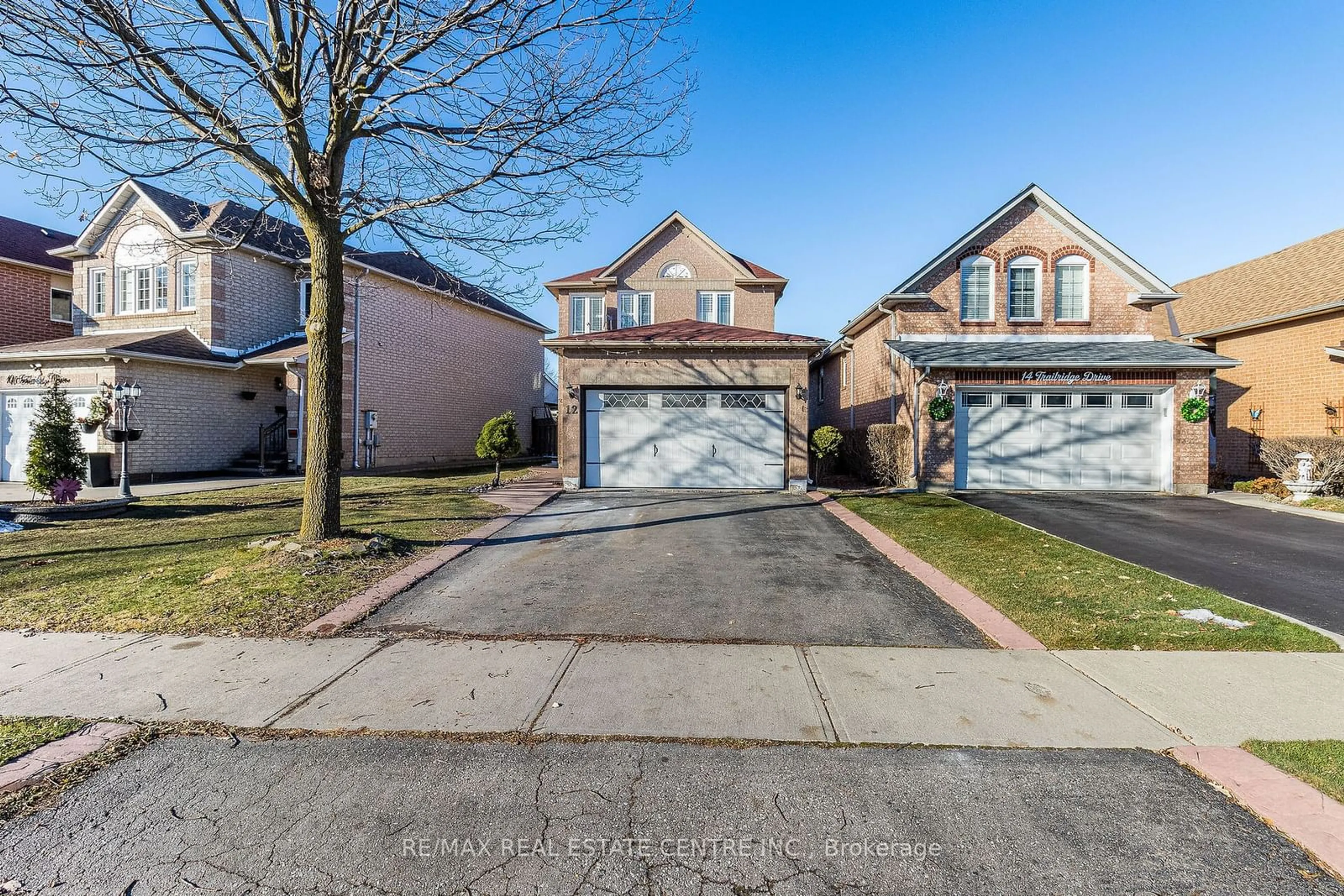 Home with brick exterior material, street for 12 Trailridge Dr, Brampton Ontario L6X 4M6