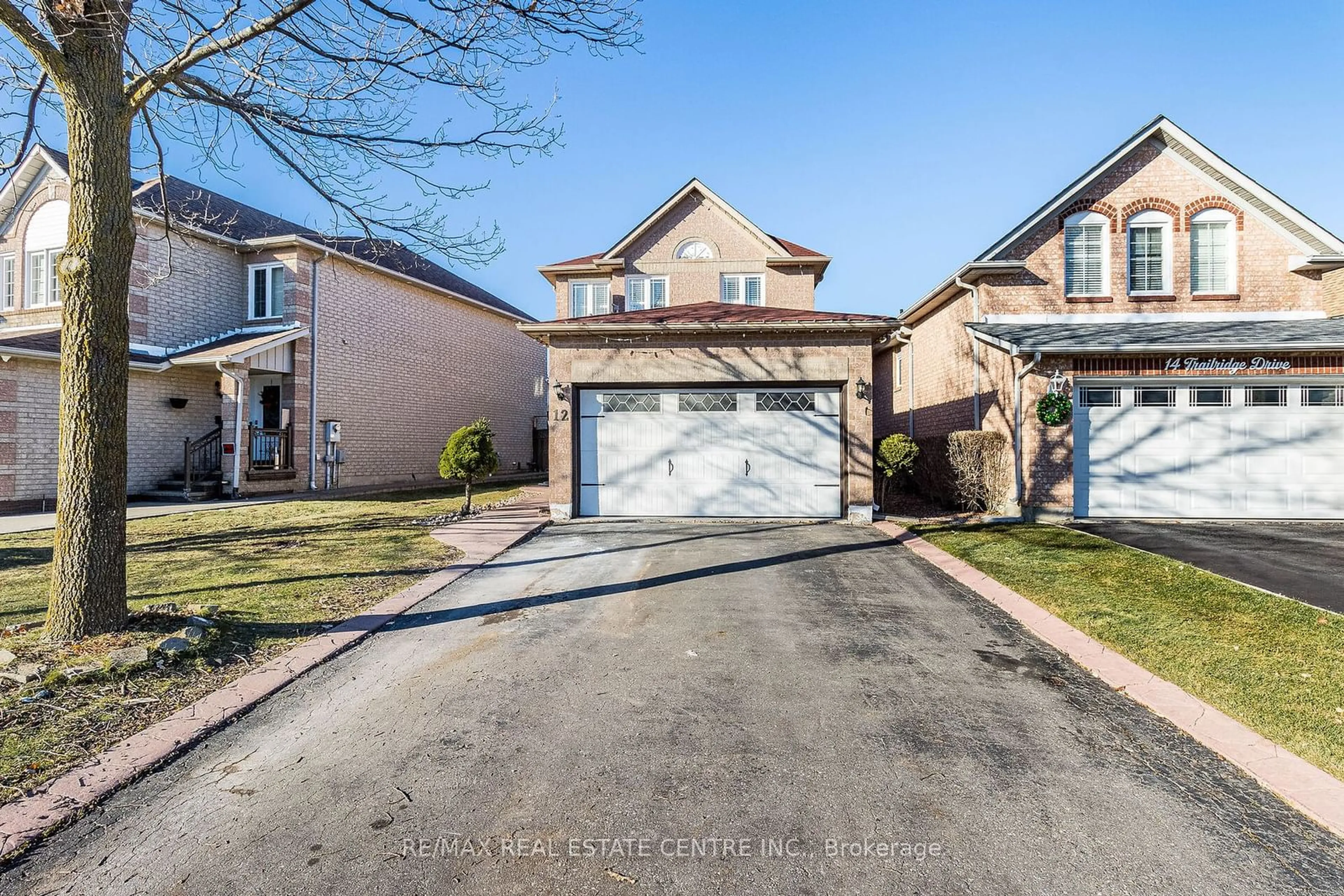 Home with brick exterior material, street for 12 Trailridge Dr, Brampton Ontario L6X 4M6