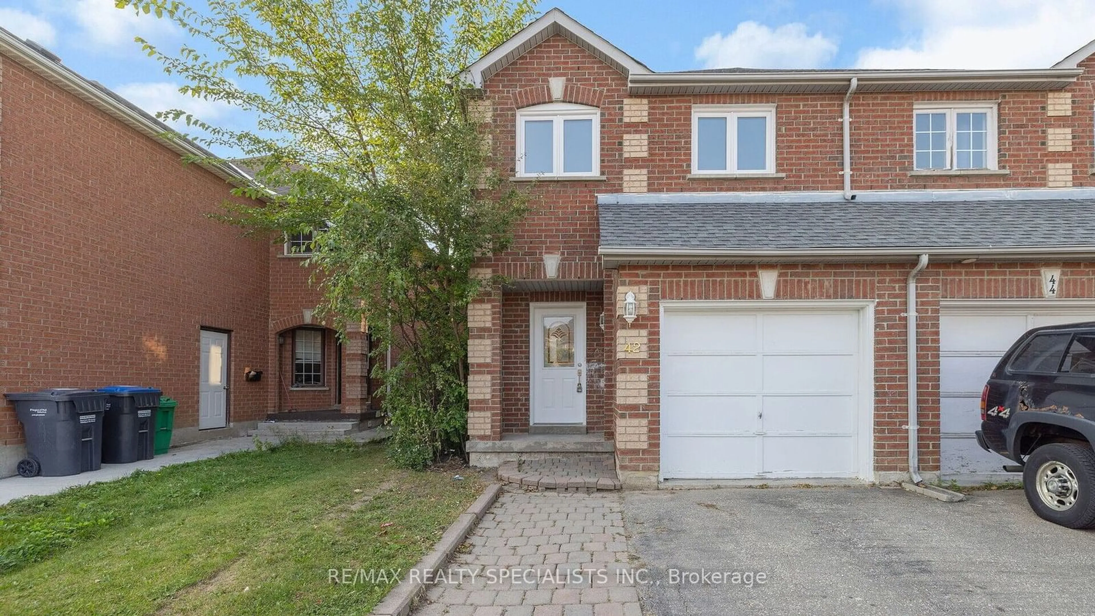 Home with brick exterior material, street for 42 Caruso Dr, Brampton Ontario L6Y 5B2