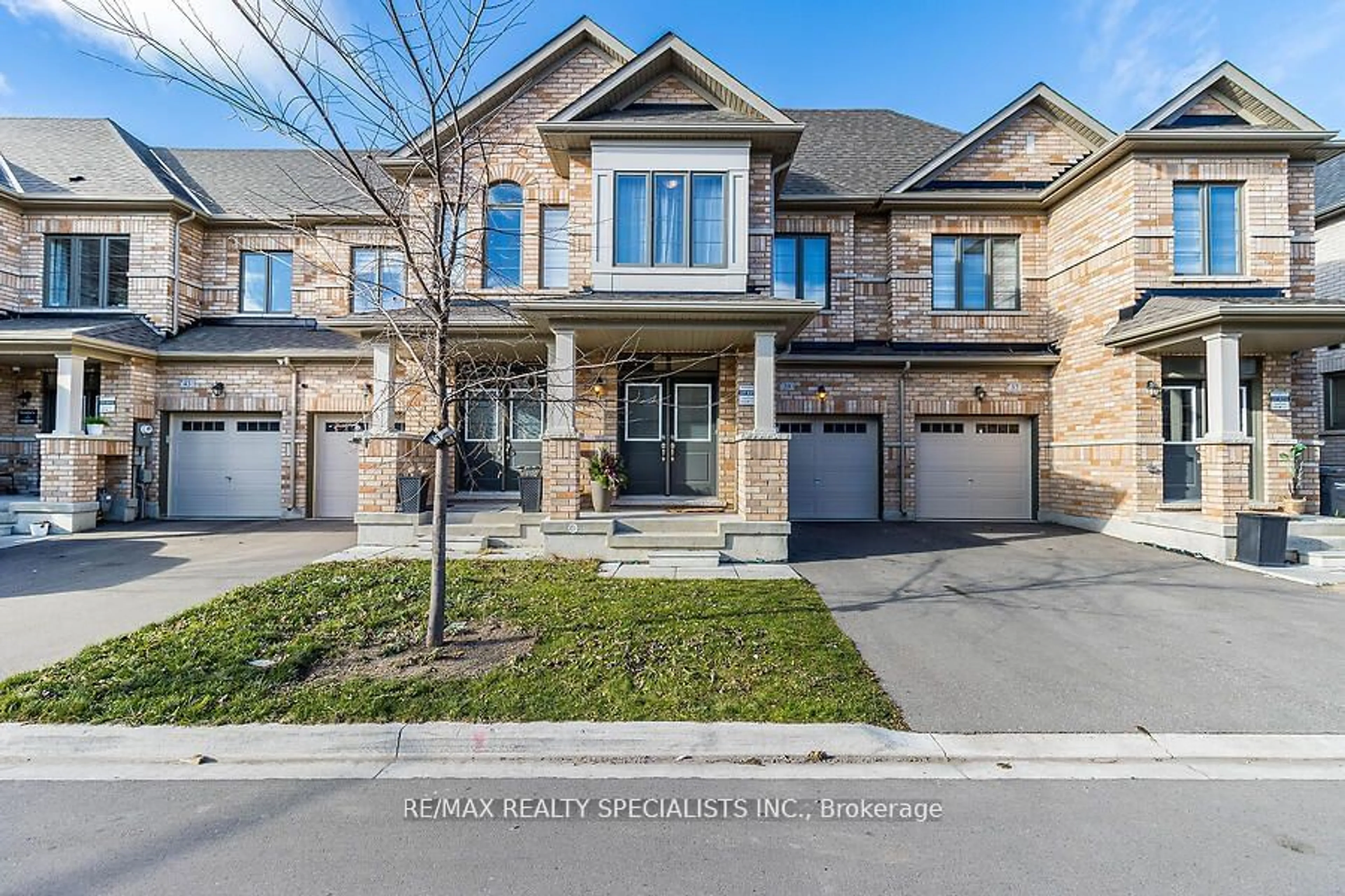 Home with brick exterior material, street for 39 Adventura Rd, Brampton Ontario L7A 5A7