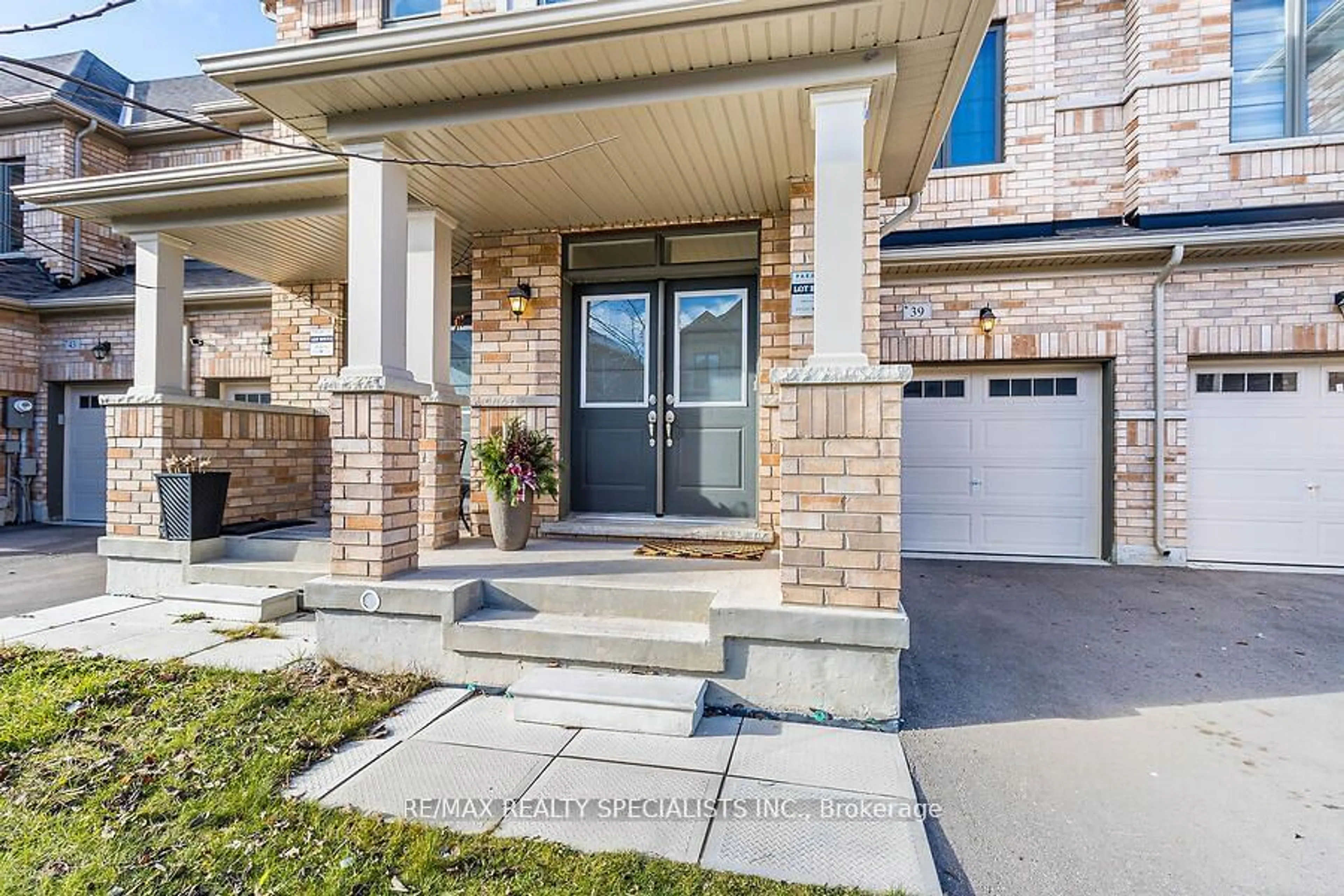 Home with brick exterior material, street for 39 Adventura Rd, Brampton Ontario L7A 5A7