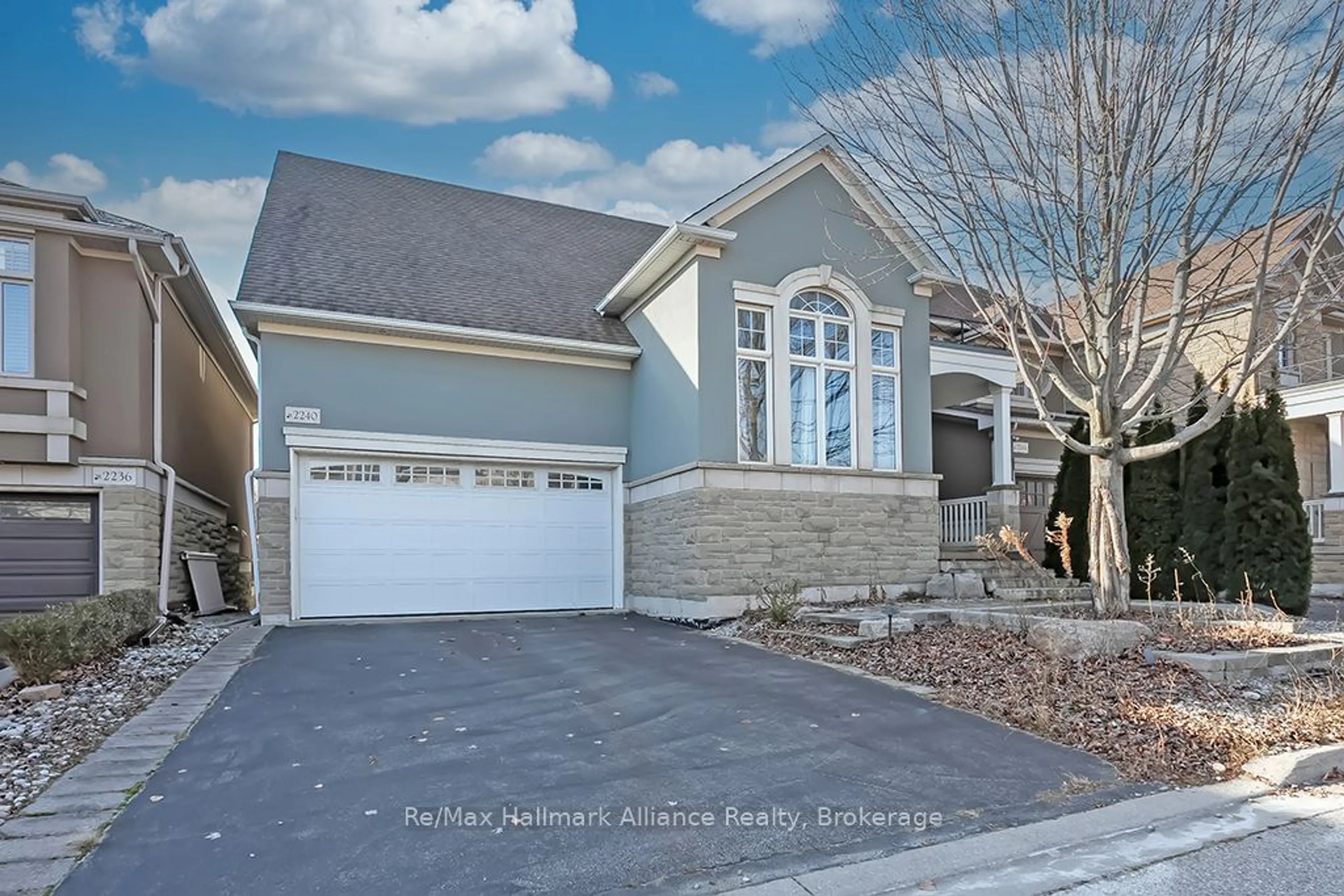 Home with vinyl exterior material, street for 2240 Blackbird Crt, Oakville Ontario L6M 5E6