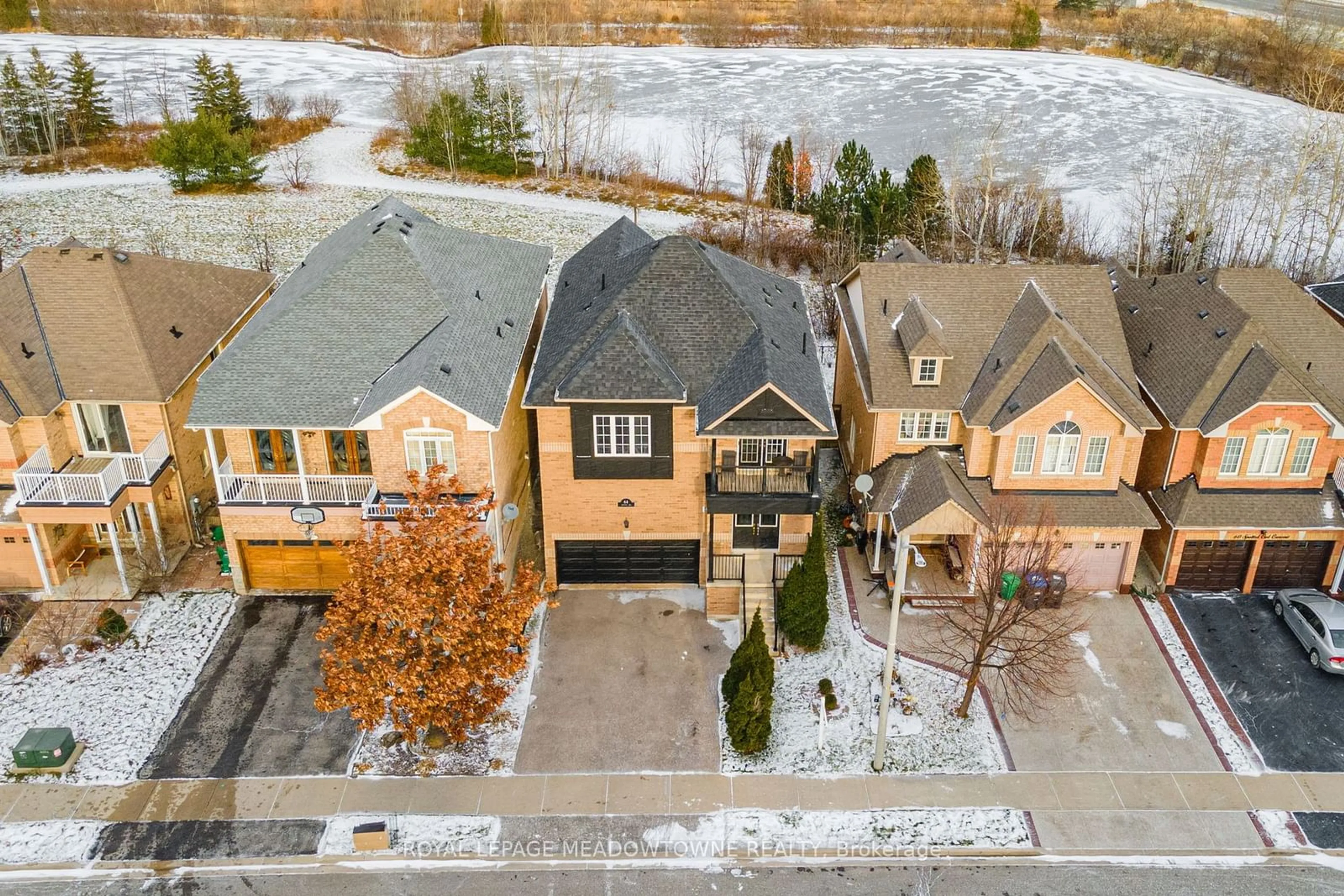 A pic from outside/outdoor area/front of a property/back of a property/a pic from drone, street for 64 Spotted Owl Cres, Brampton Ontario L7A 0K1