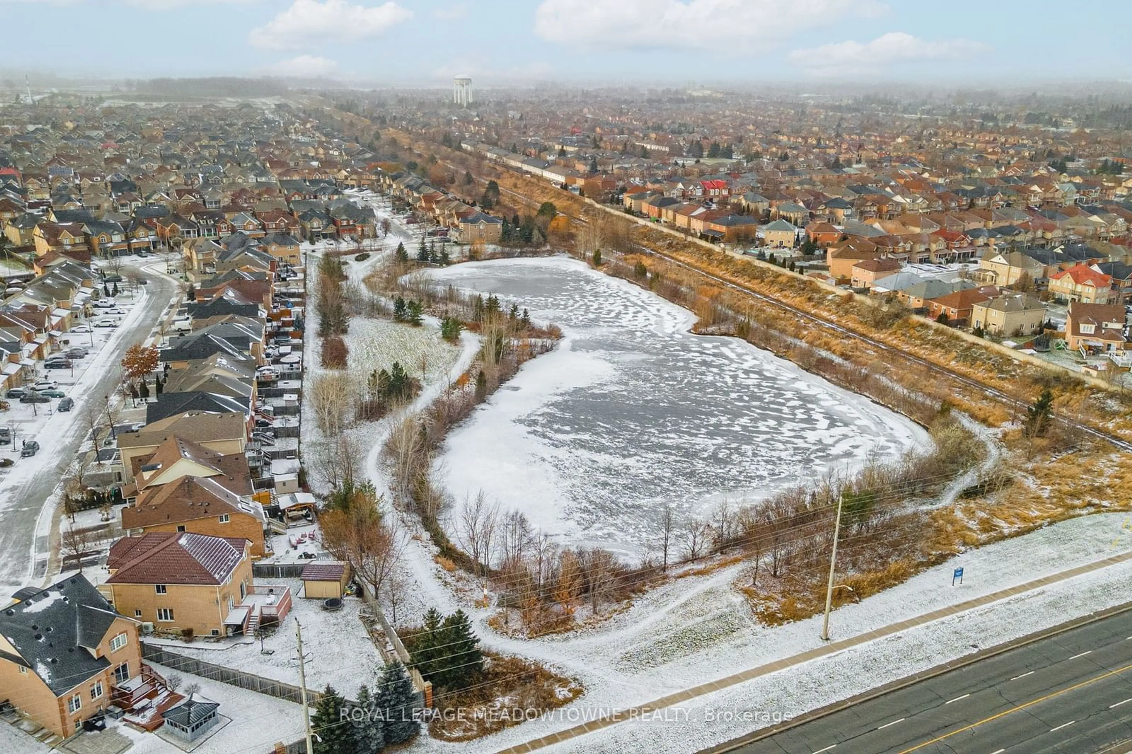 A pic from outside/outdoor area/front of a property/back of a property/a pic from drone, street for 64 Spotted Owl Cres, Brampton Ontario L7A 0K1