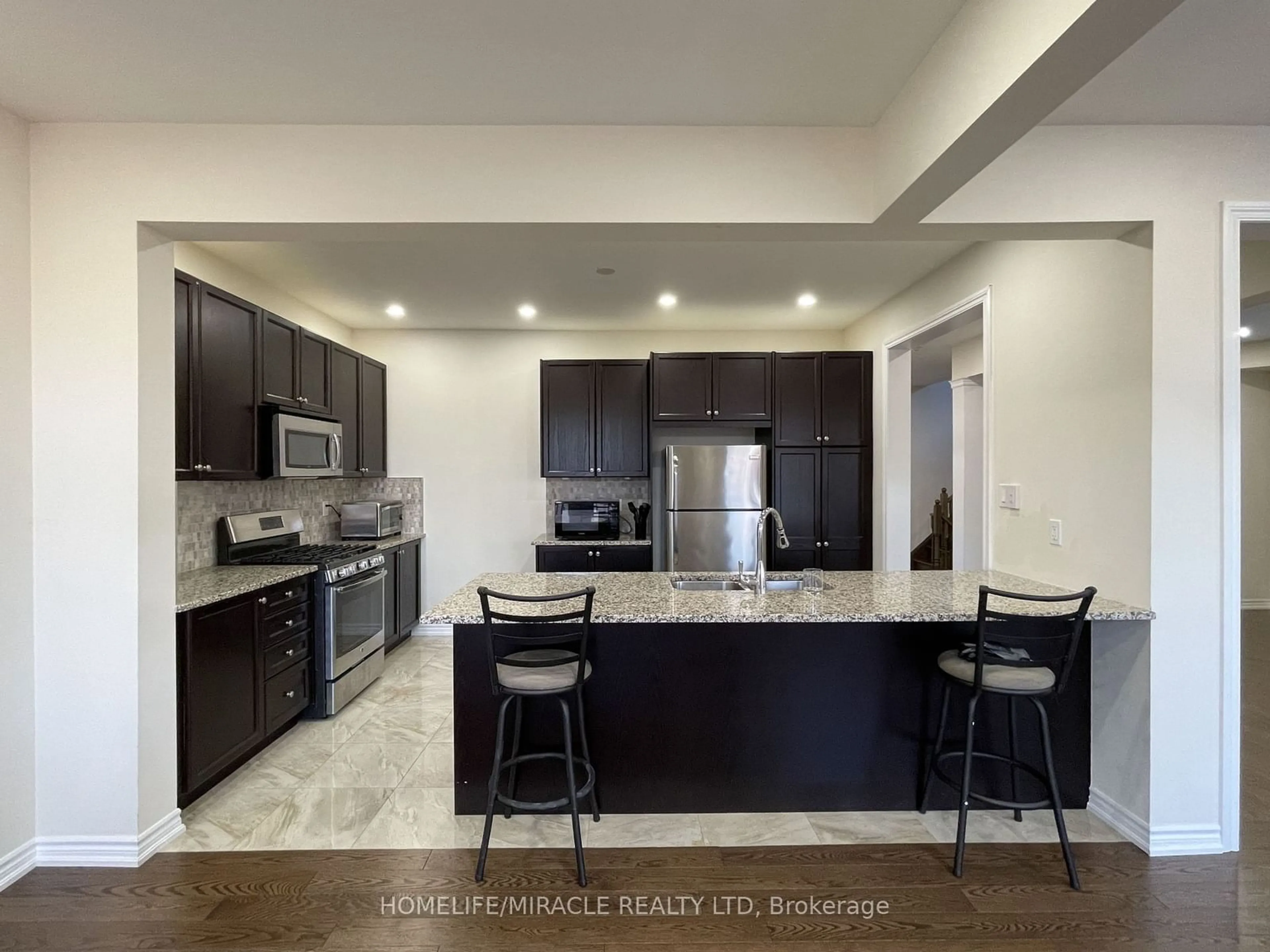 Open concept kitchen, ceramic/tile floor for 84 Roulette Cres, Brampton Ontario L7A 4R6