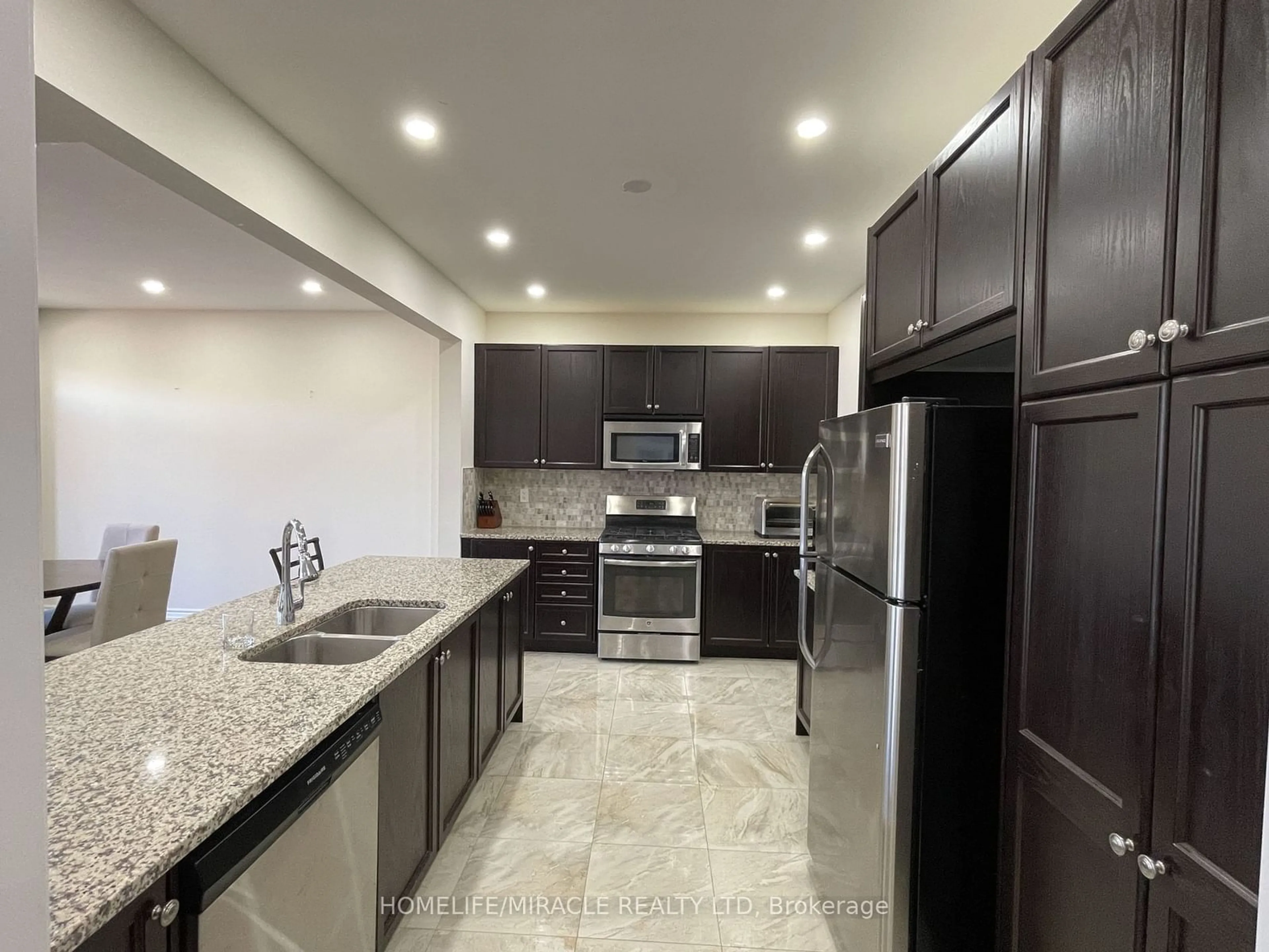 Open concept kitchen, ceramic/tile floor for 84 Roulette Cres, Brampton Ontario L7A 4R6