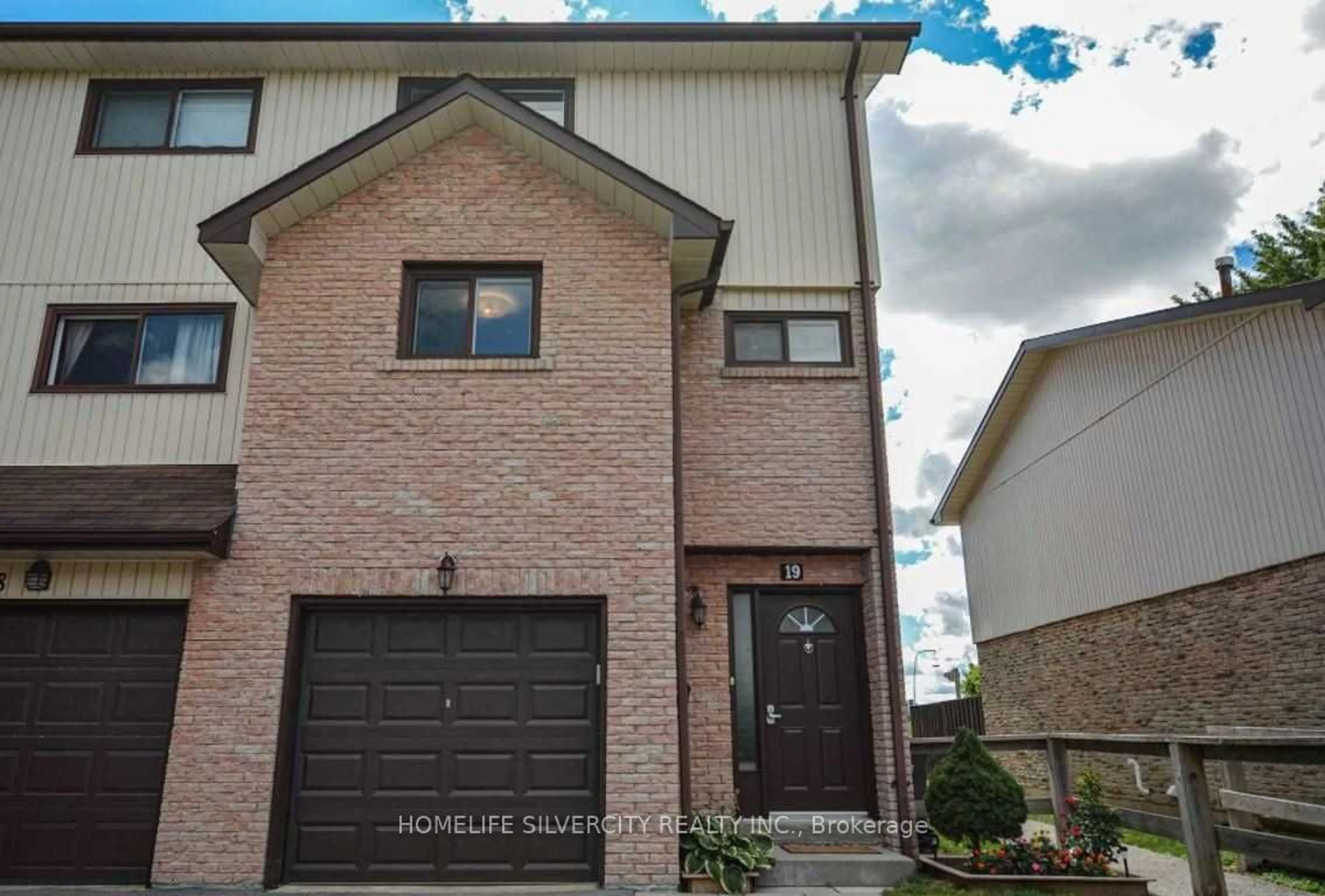 Home with brick exterior material, street for 19 Dawson Cres #19, Brampton Ontario L6V 3M5