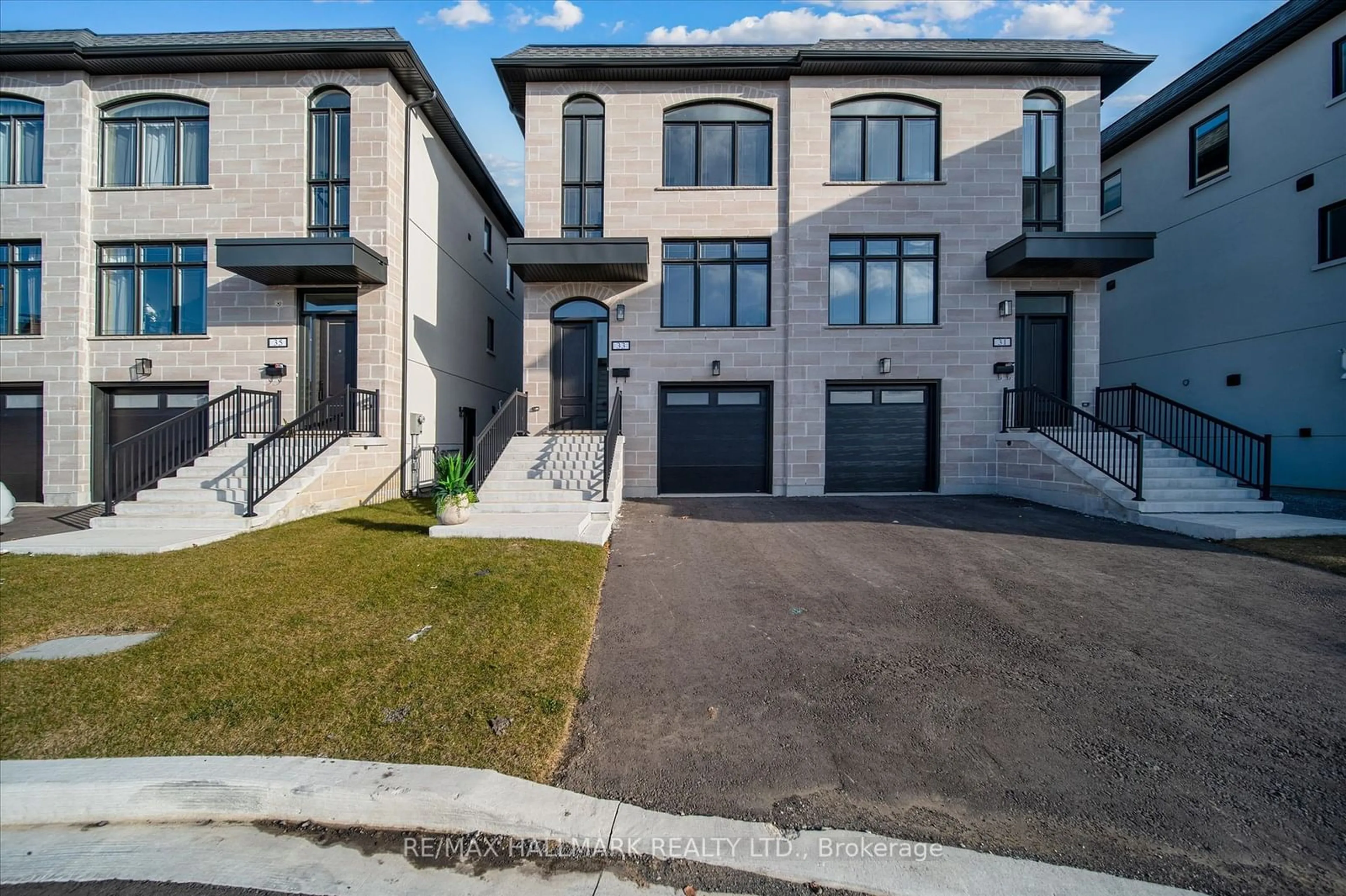 Home with brick exterior material, street for 33 St.Gaspar's Crt, Toronto Ontario M9L 2J7