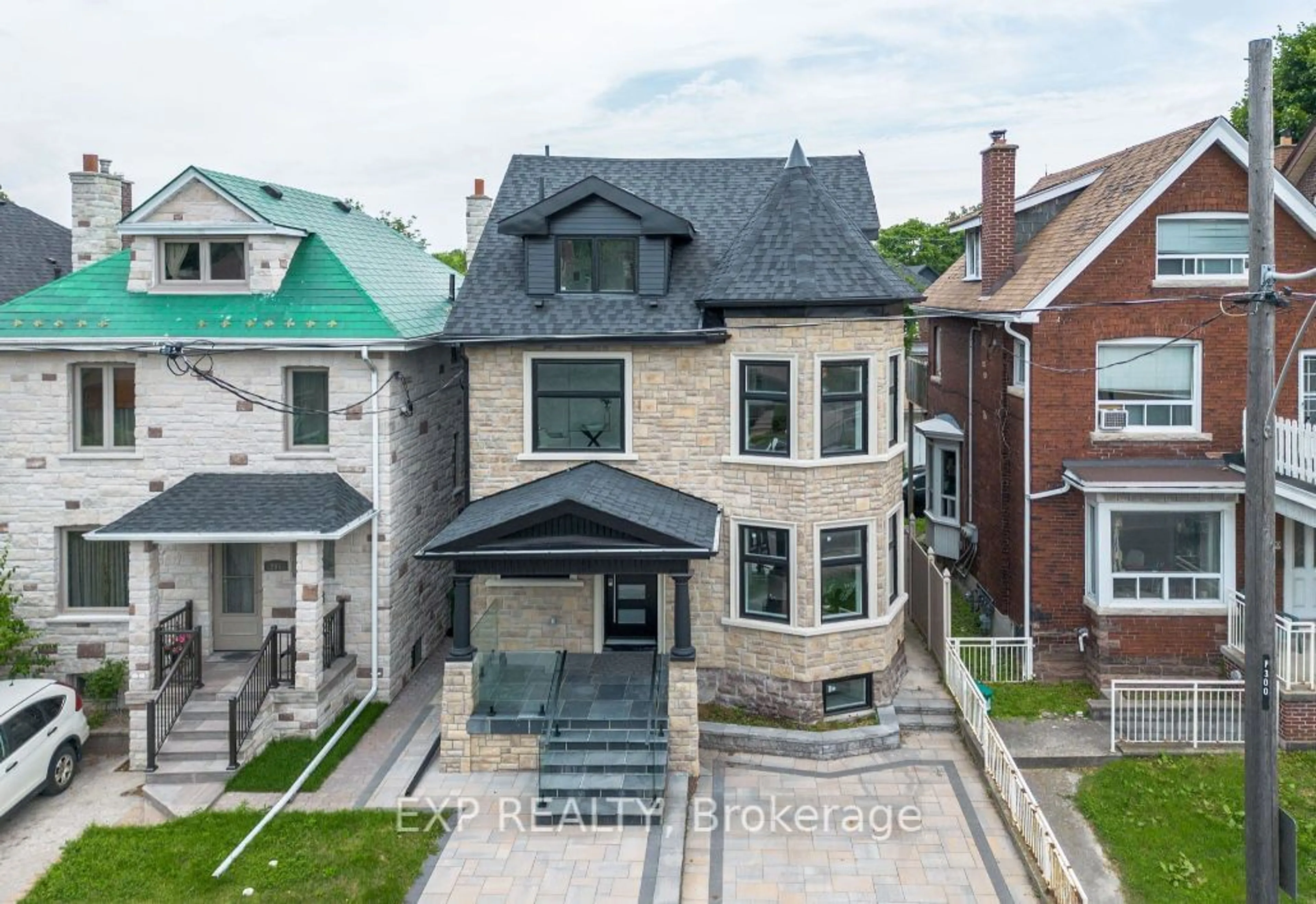 A pic from outside/outdoor area/front of a property/back of a property/a pic from drone, street for 298 Keele St, Toronto Ontario M6P 2K4