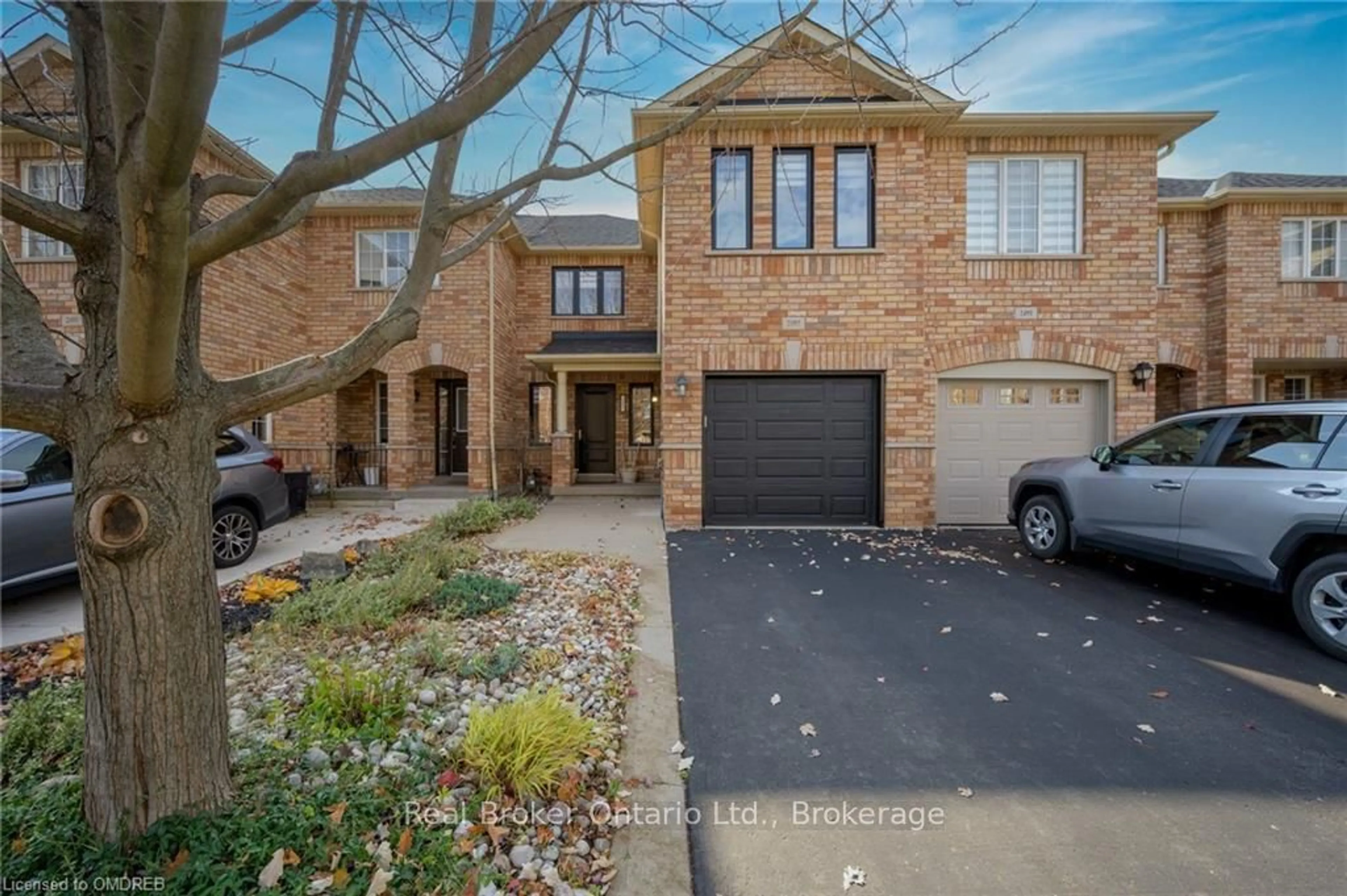 Home with brick exterior material, street for 2493 Newcastle Cres, Oakville Ontario L6M 4P3