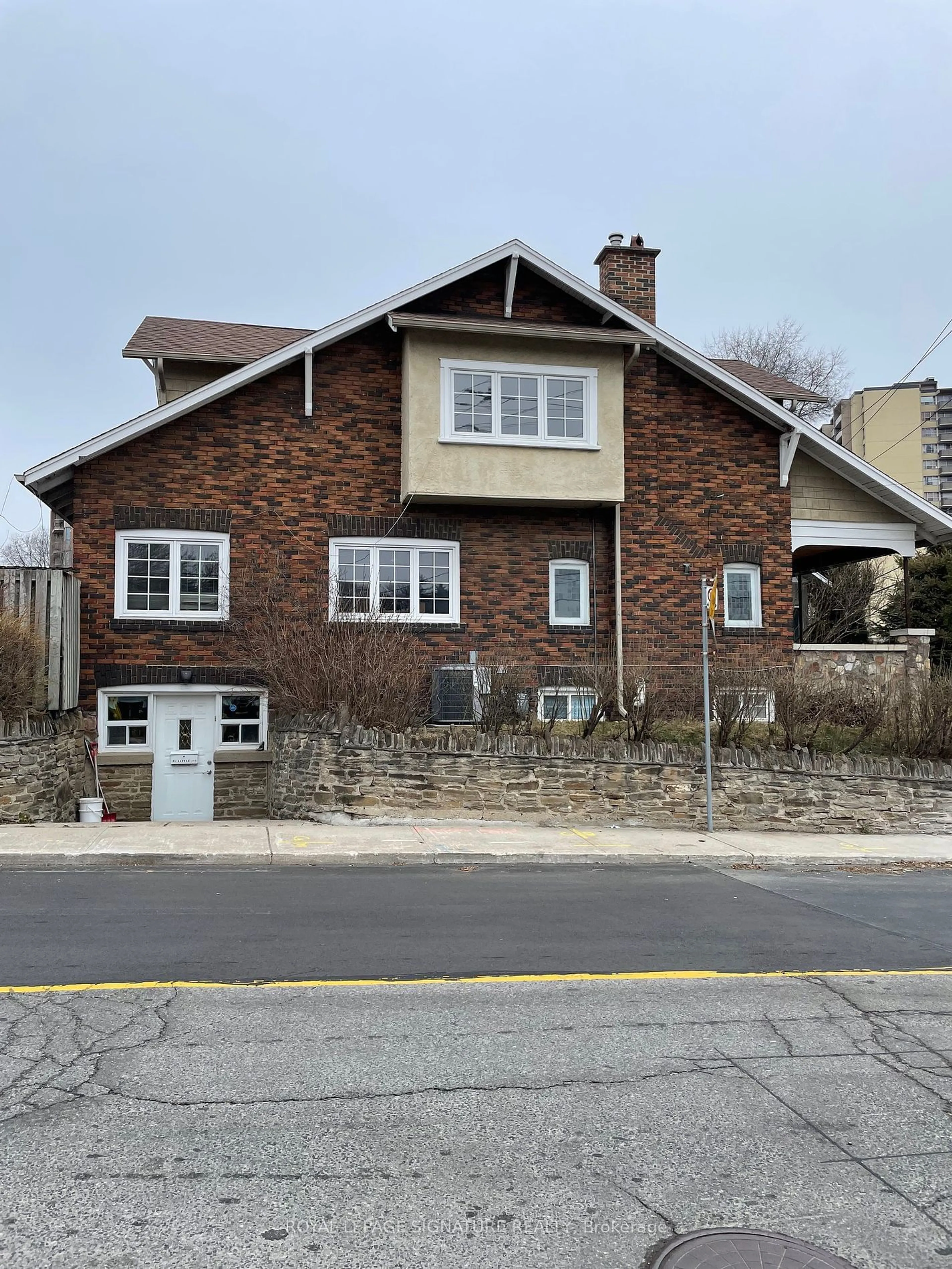 Home with brick exterior material, street for 2114 Lawrence Ave, Toronto Ontario M9N 1J1