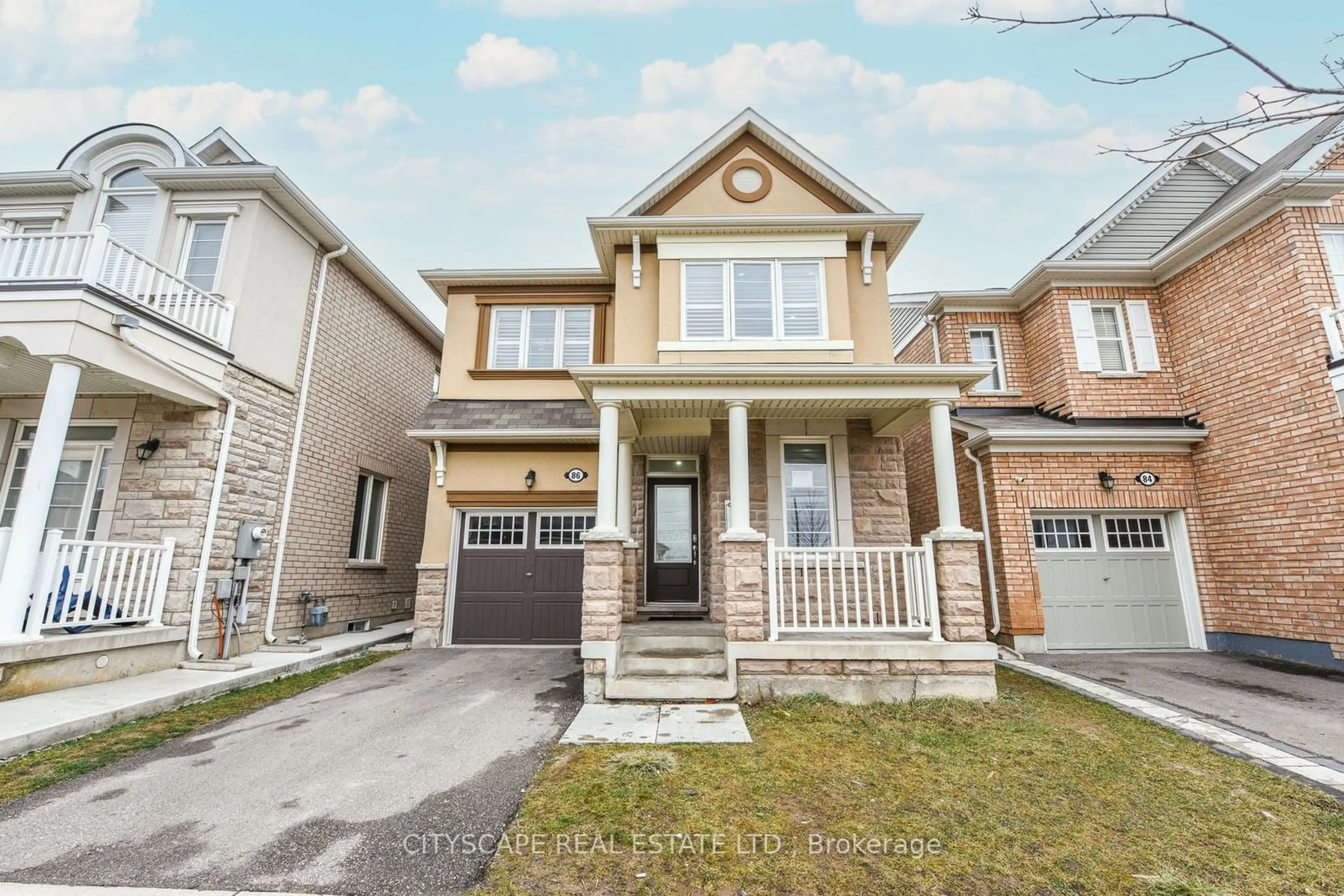 Home with brick exterior material, street for 86 Rockbrook Tr, Brampton Ontario L7A 4A8