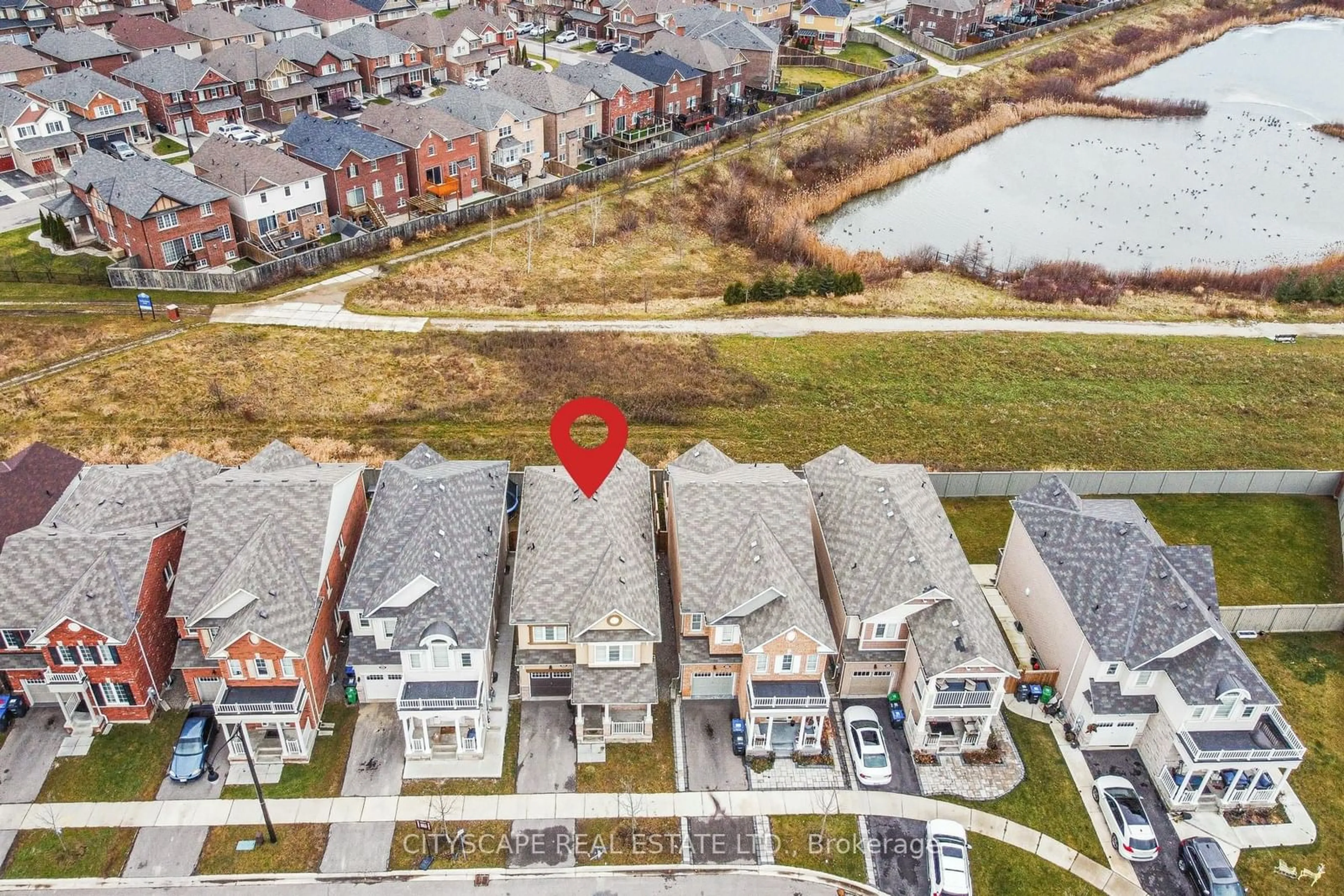 A pic from outside/outdoor area/front of a property/back of a property/a pic from drone, water/lake/river/ocean view for 86 Rockbrook Tr, Brampton Ontario L7A 4A8