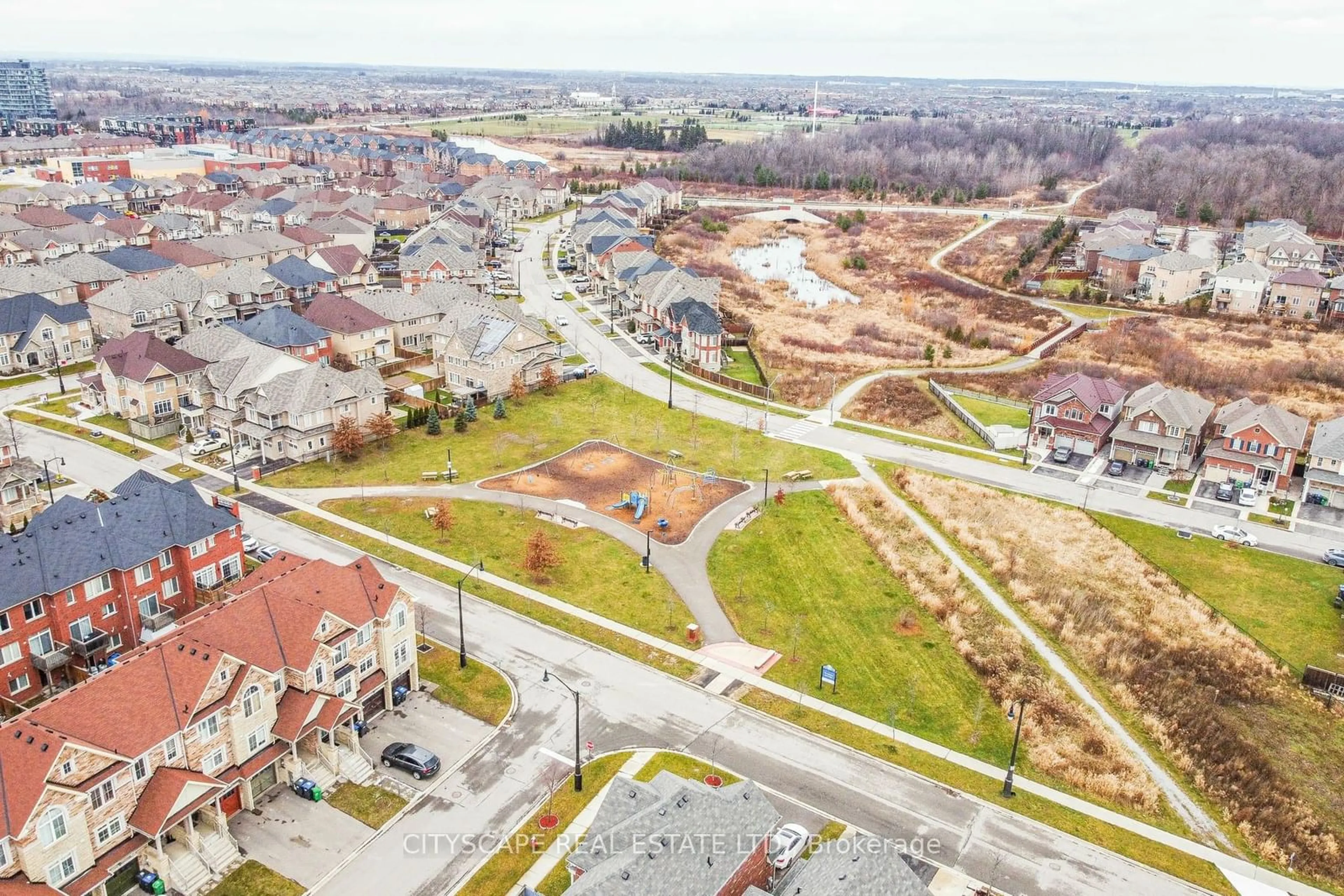 A pic from outside/outdoor area/front of a property/back of a property/a pic from drone, street for 86 Rockbrook Tr, Brampton Ontario L7A 4A8