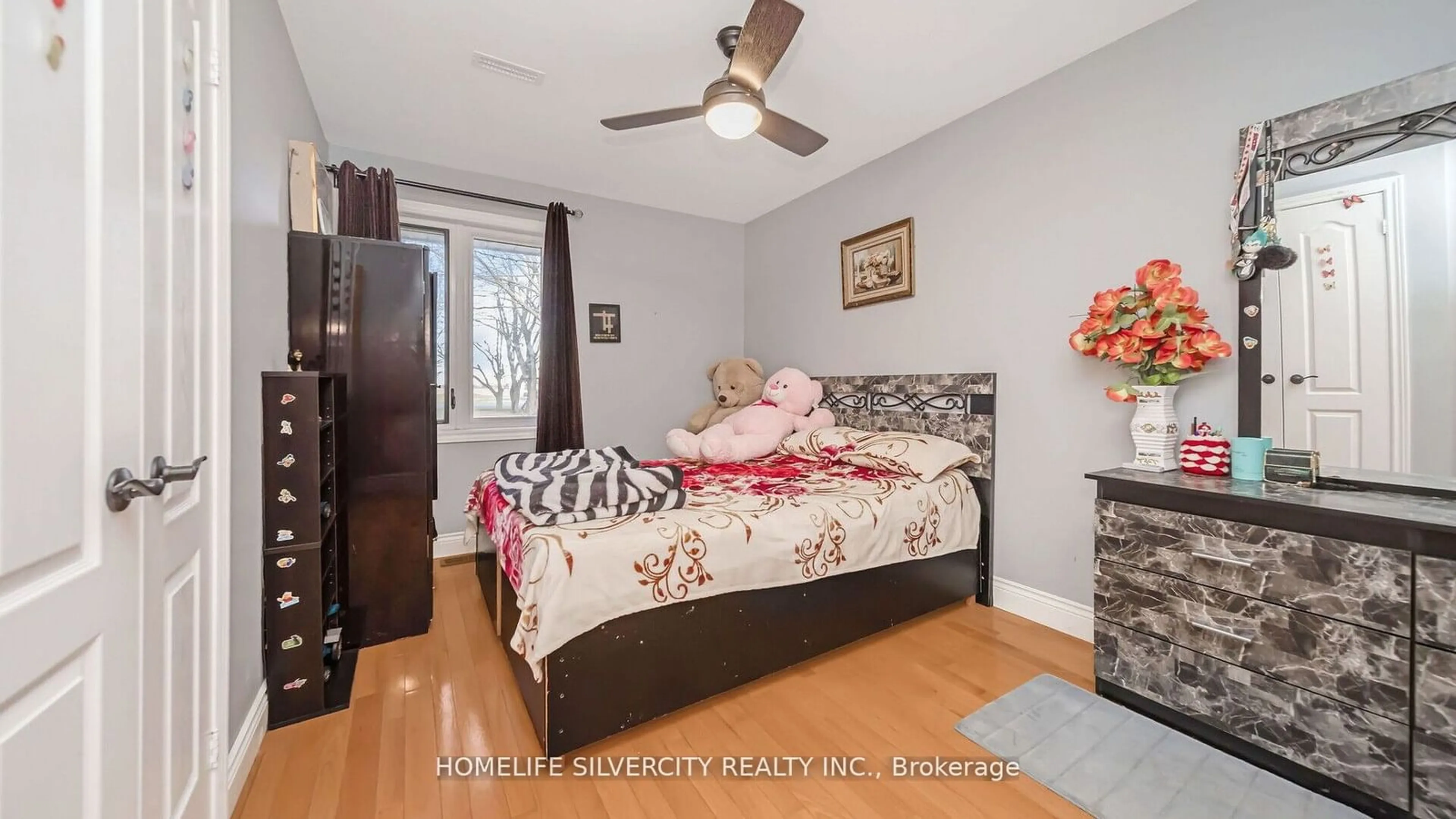 Bedroom with bed, wood/laminate floor for 14208 Torbram Rd, Caledon Ontario L7C 2T1