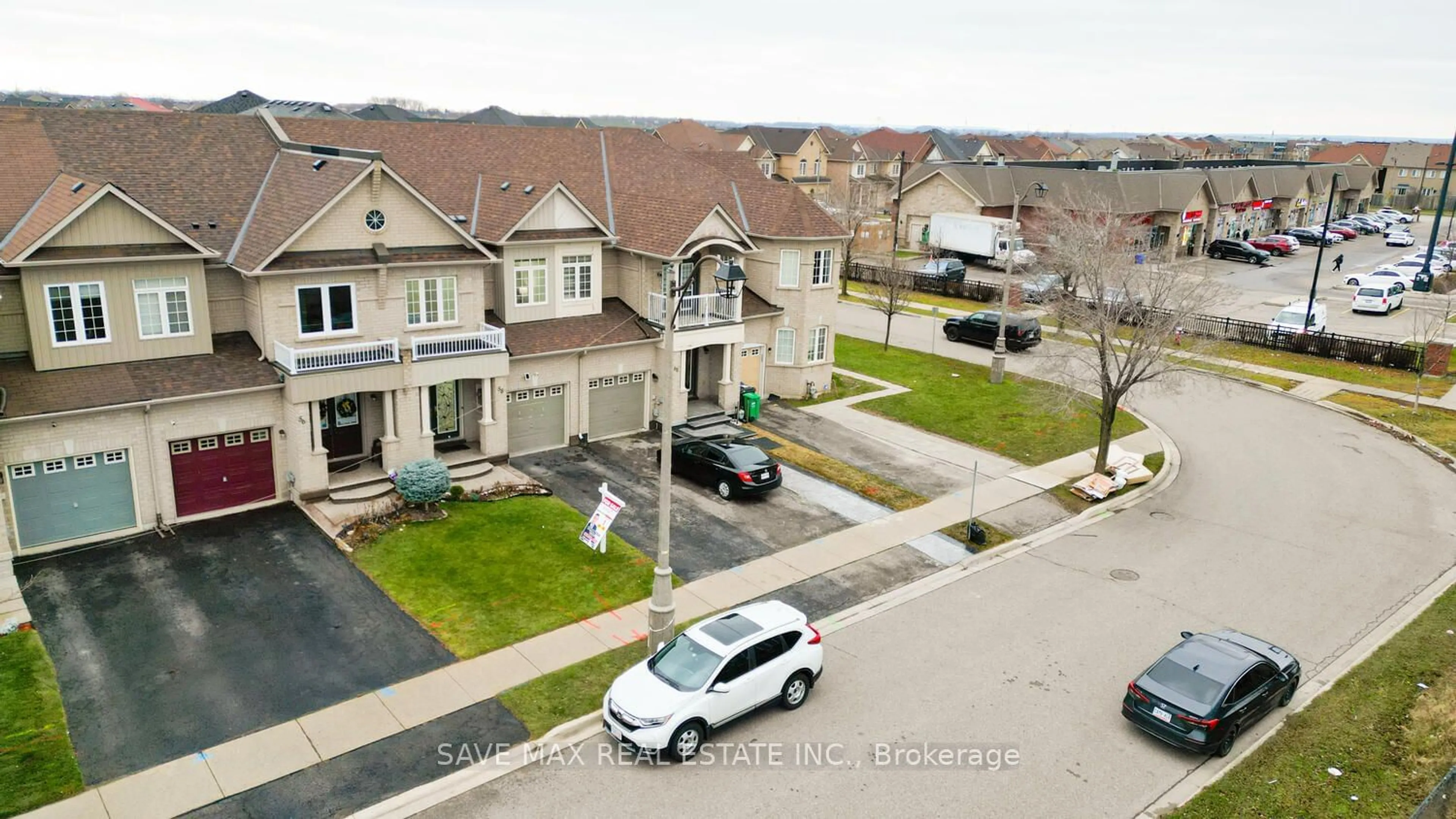 A pic from outside/outdoor area/front of a property/back of a property/a pic from drone, street for 58 Kilrea Way, Brampton Ontario L6X 0R1