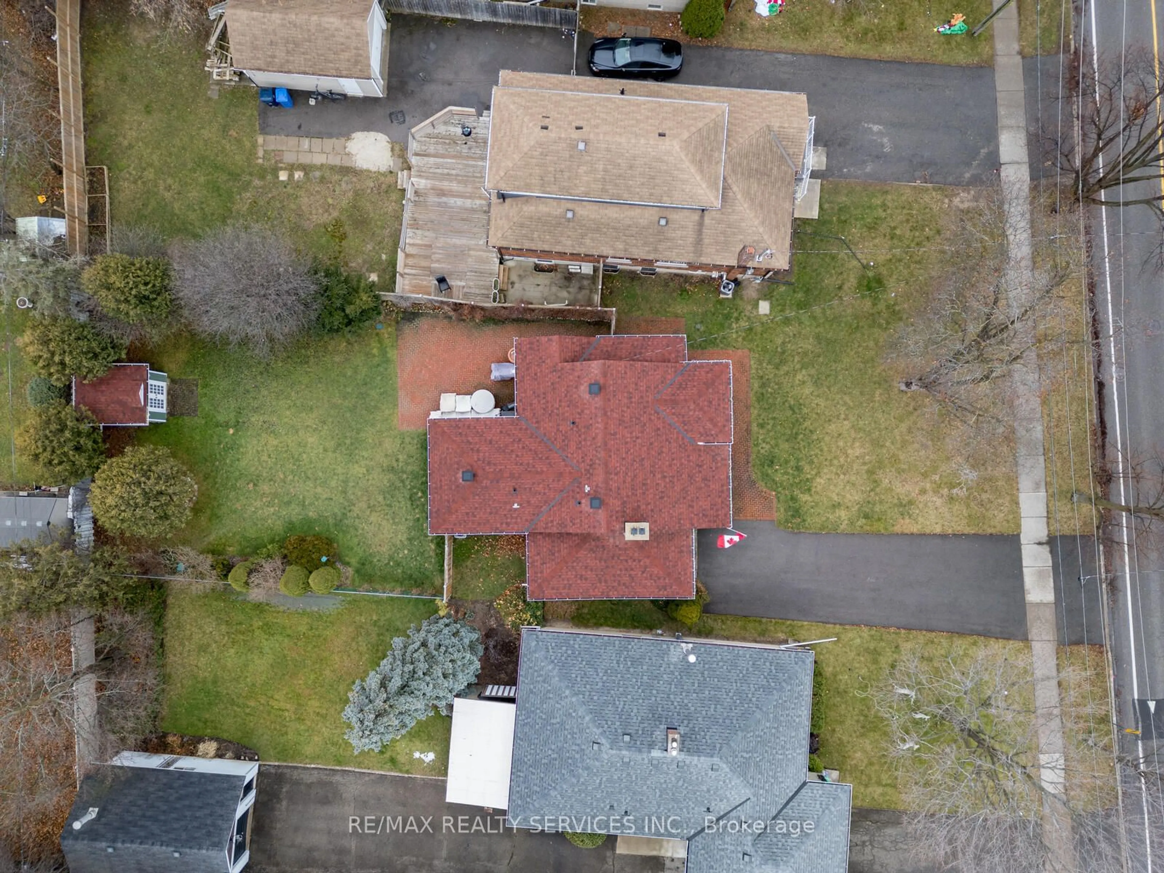 A pic from outside/outdoor area/front of a property/back of a property/a pic from drone, street for 111 Denison Ave, Brampton Ontario L6X 1E9