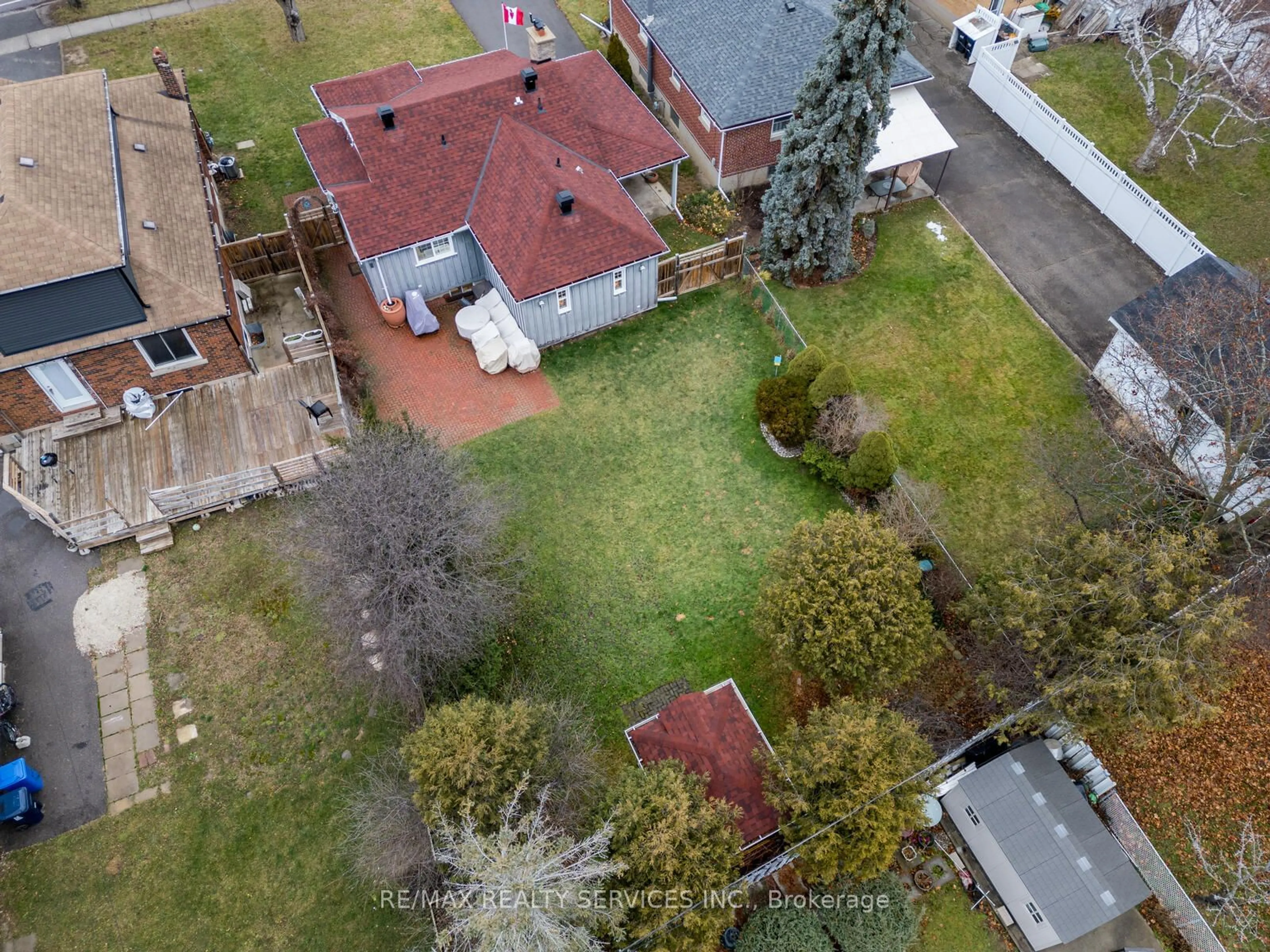 A pic from outside/outdoor area/front of a property/back of a property/a pic from drone, street for 111 Denison Ave, Brampton Ontario L6X 1E9