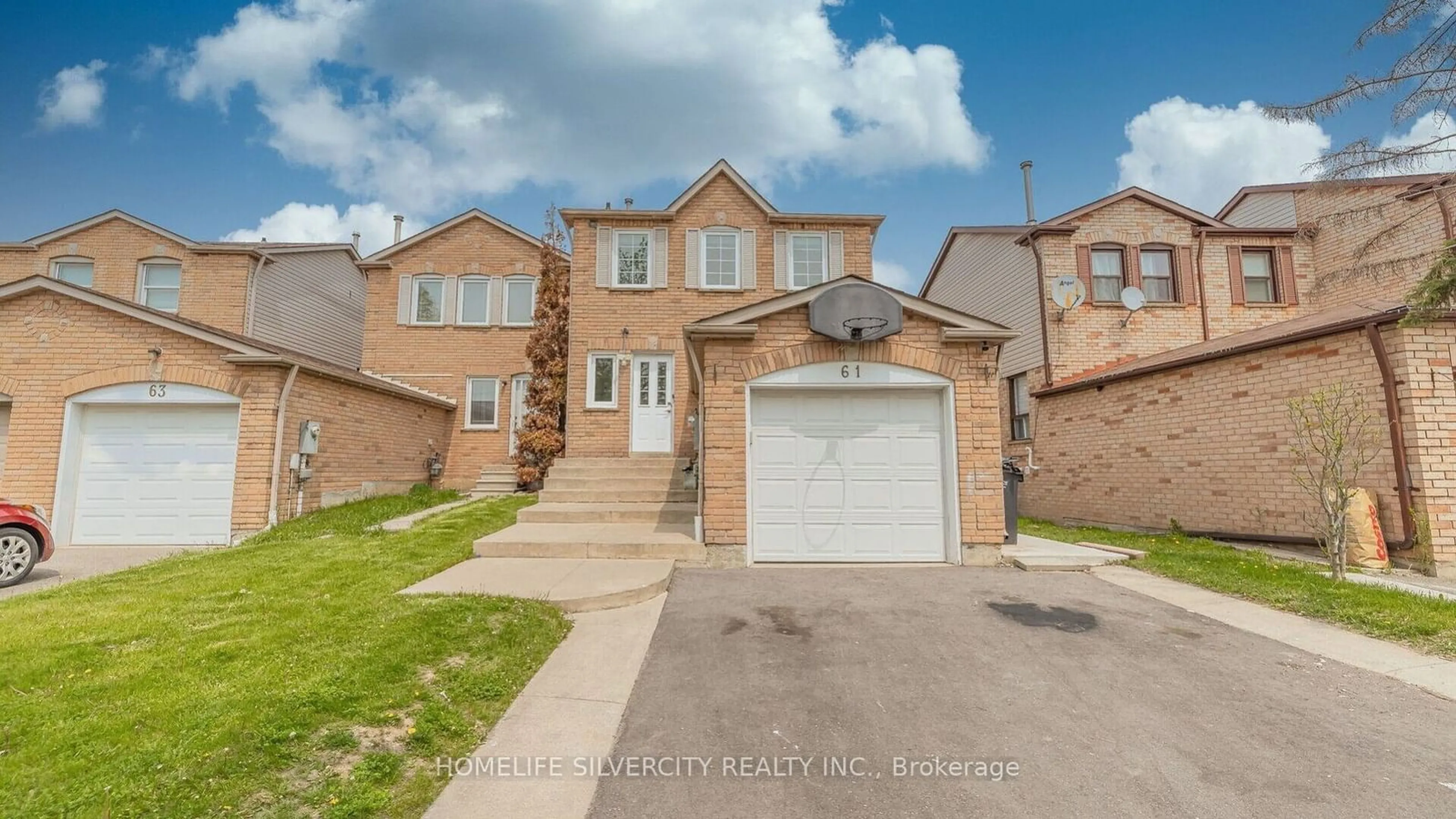 Home with brick exterior material, street for 61 Cutters Cres, Brampton Ontario L6Y 4M2