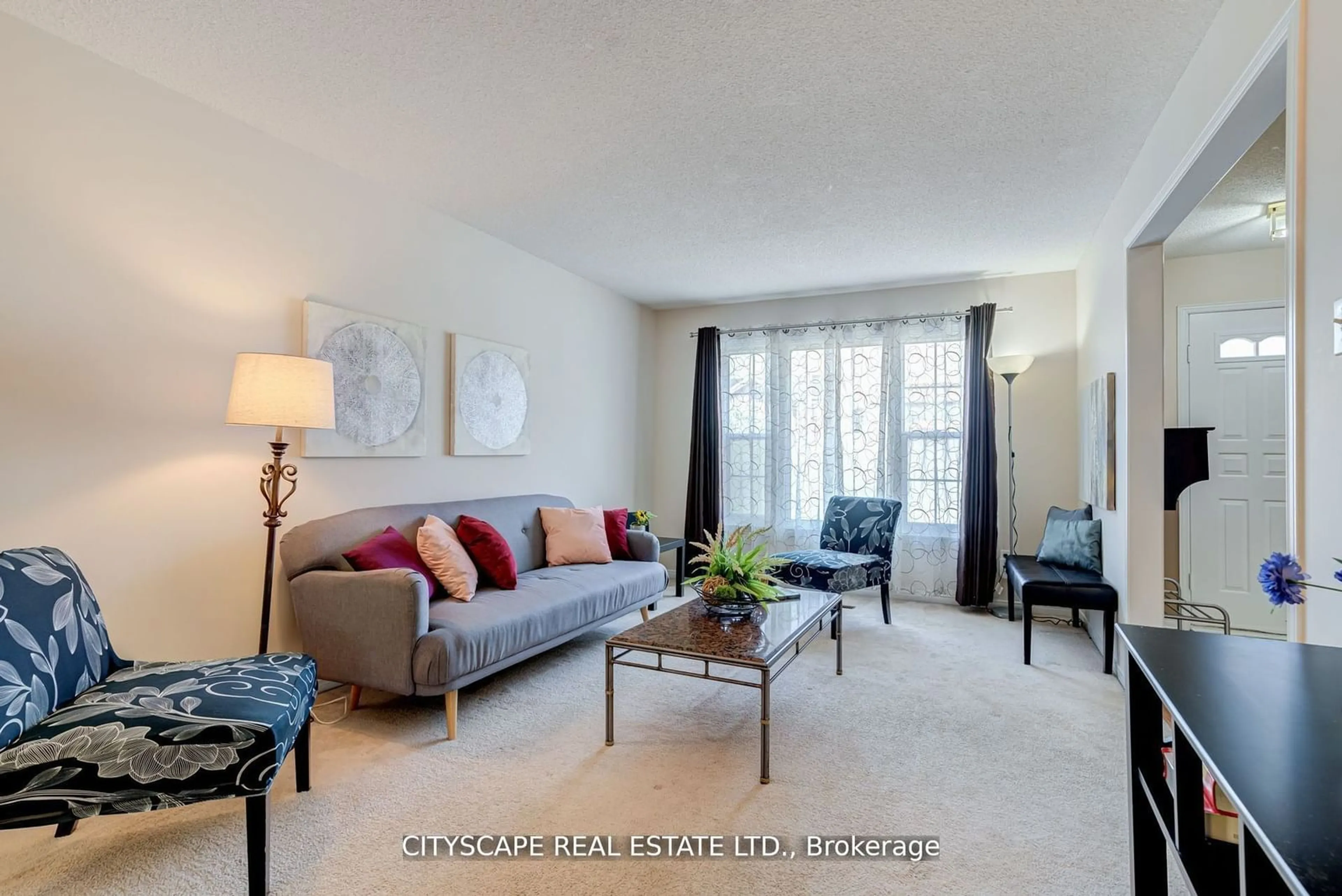 Living room with furniture, carpet floor for 46 Nuttall St, Brampton Ontario L6S 4V6