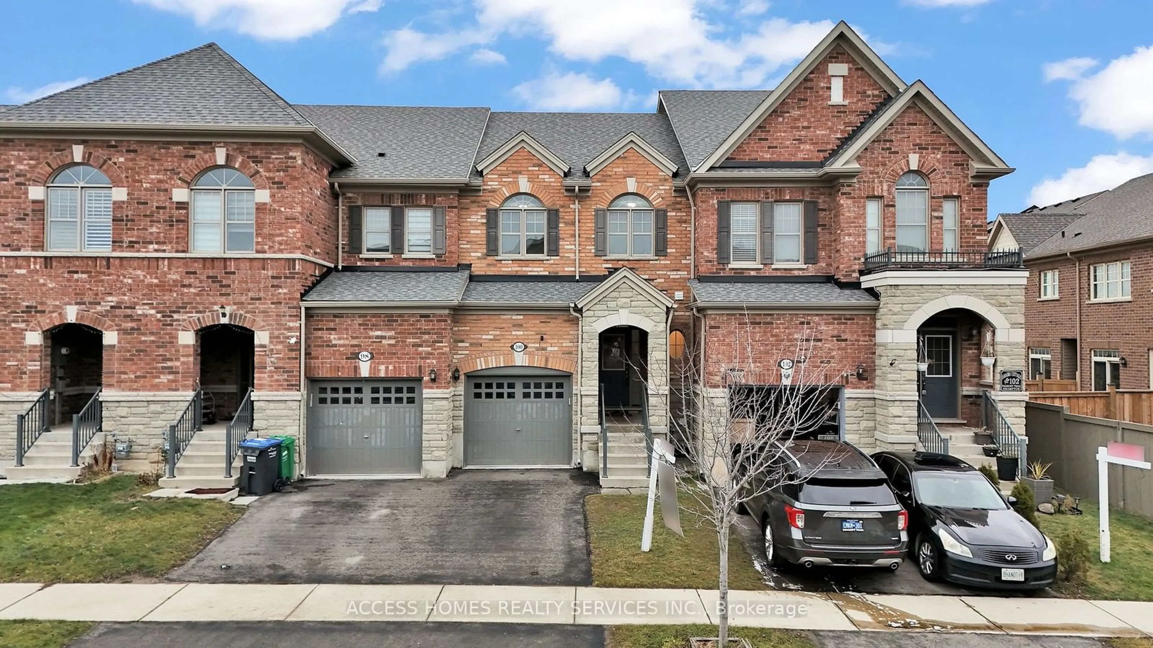 Home with brick exterior material, street for 100 Padbury Tr, Brampton Ontario L7A 4V4