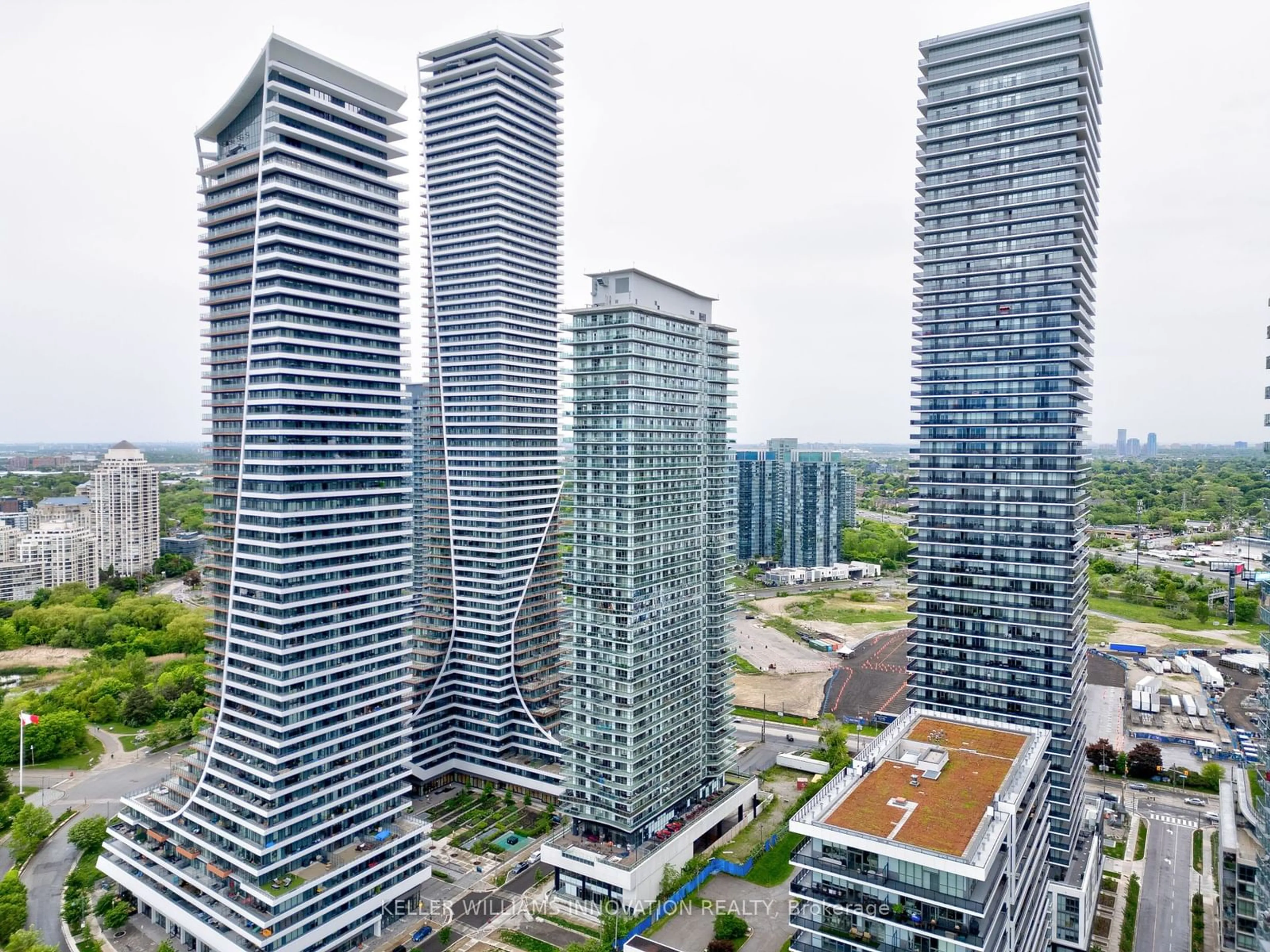 A pic from outside/outdoor area/front of a property/back of a property/a pic from drone, city buildings view from balcony for 33 Shore Breeze Dr #1105, Toronto Ontario M8V 0G1