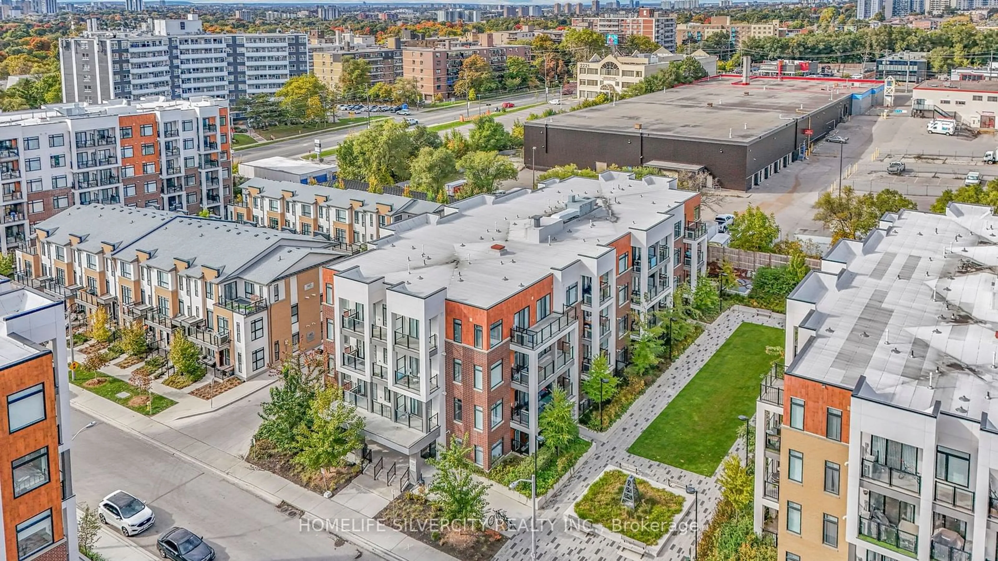 A pic from outside/outdoor area/front of a property/back of a property/a pic from drone, city buildings view from balcony for 130 Canon Jackson Dr #102, Toronto Ontario M6M 0B7