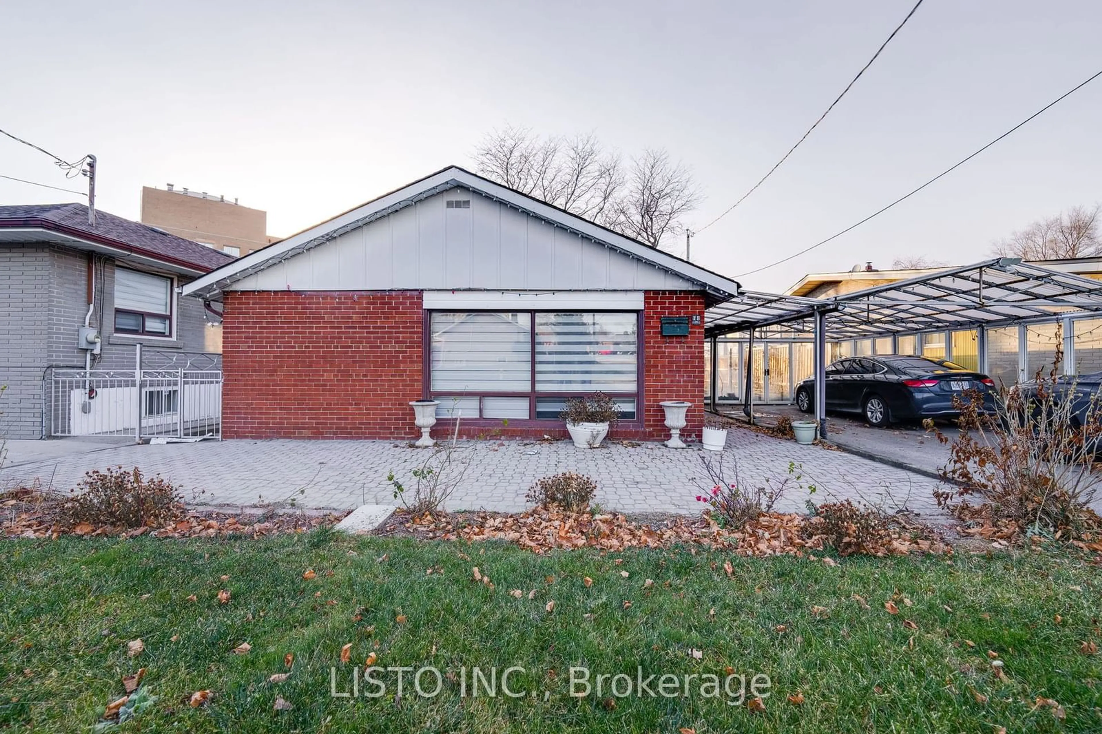 Home with brick exterior material, street for 18 Demarco Blvd, Toronto Ontario M6L 2W1