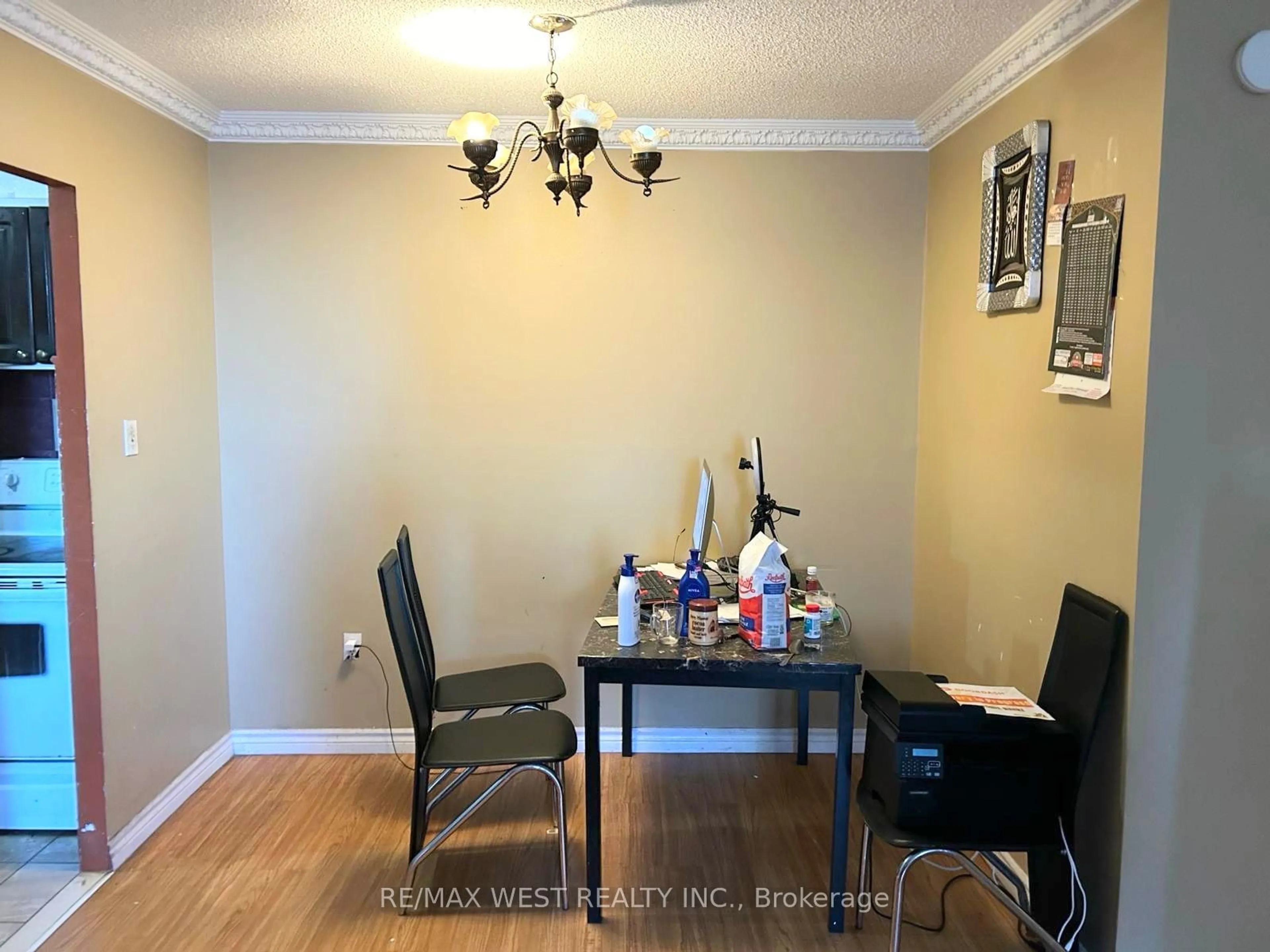 Dining room, wood/laminate floor for 330 Dixon Rd #306, Toronto Ontario M9R 1S9