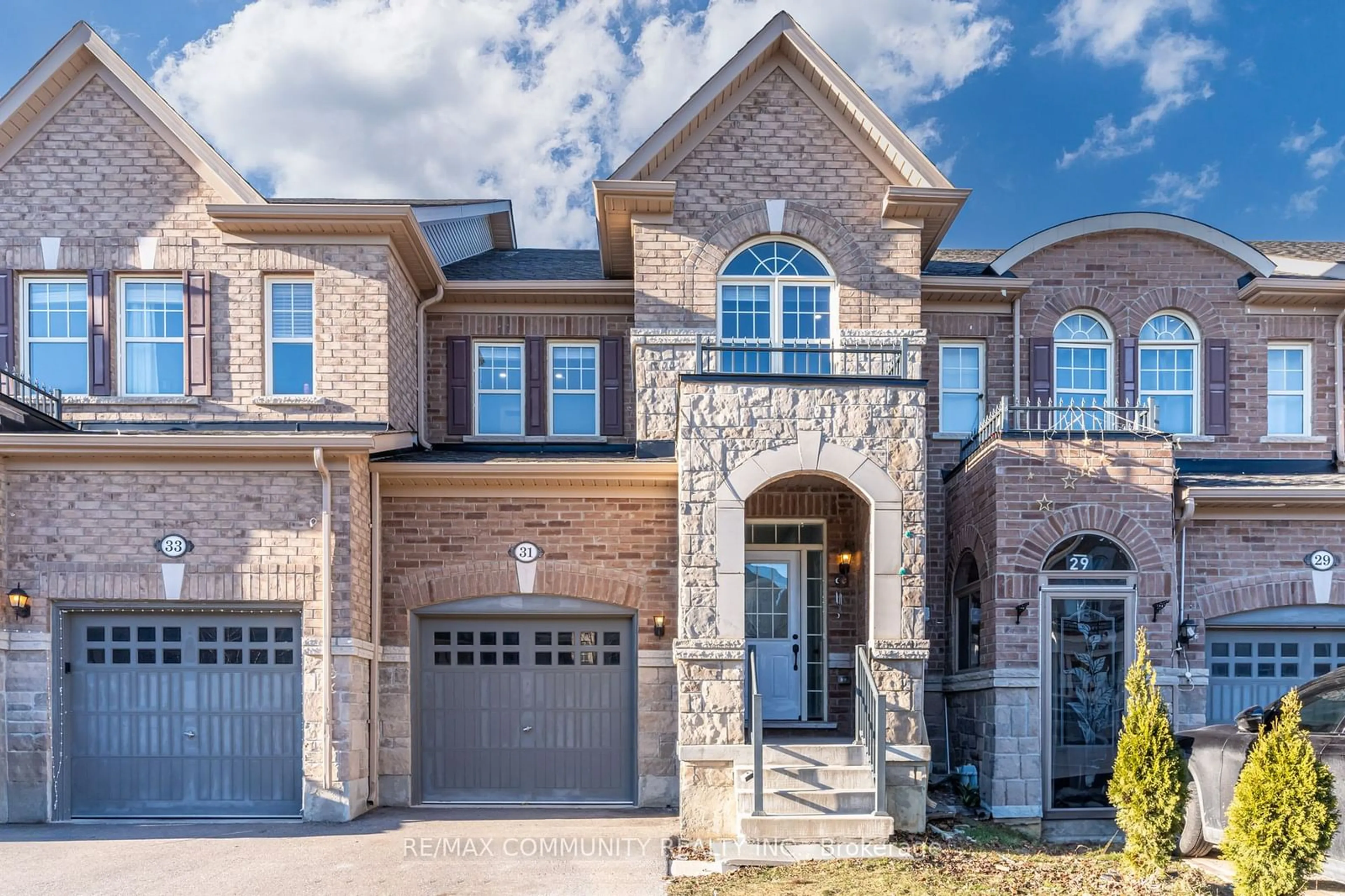 Home with brick exterior material, street for 31 Padbury Tr, Brampton Ontario L7A 4V2