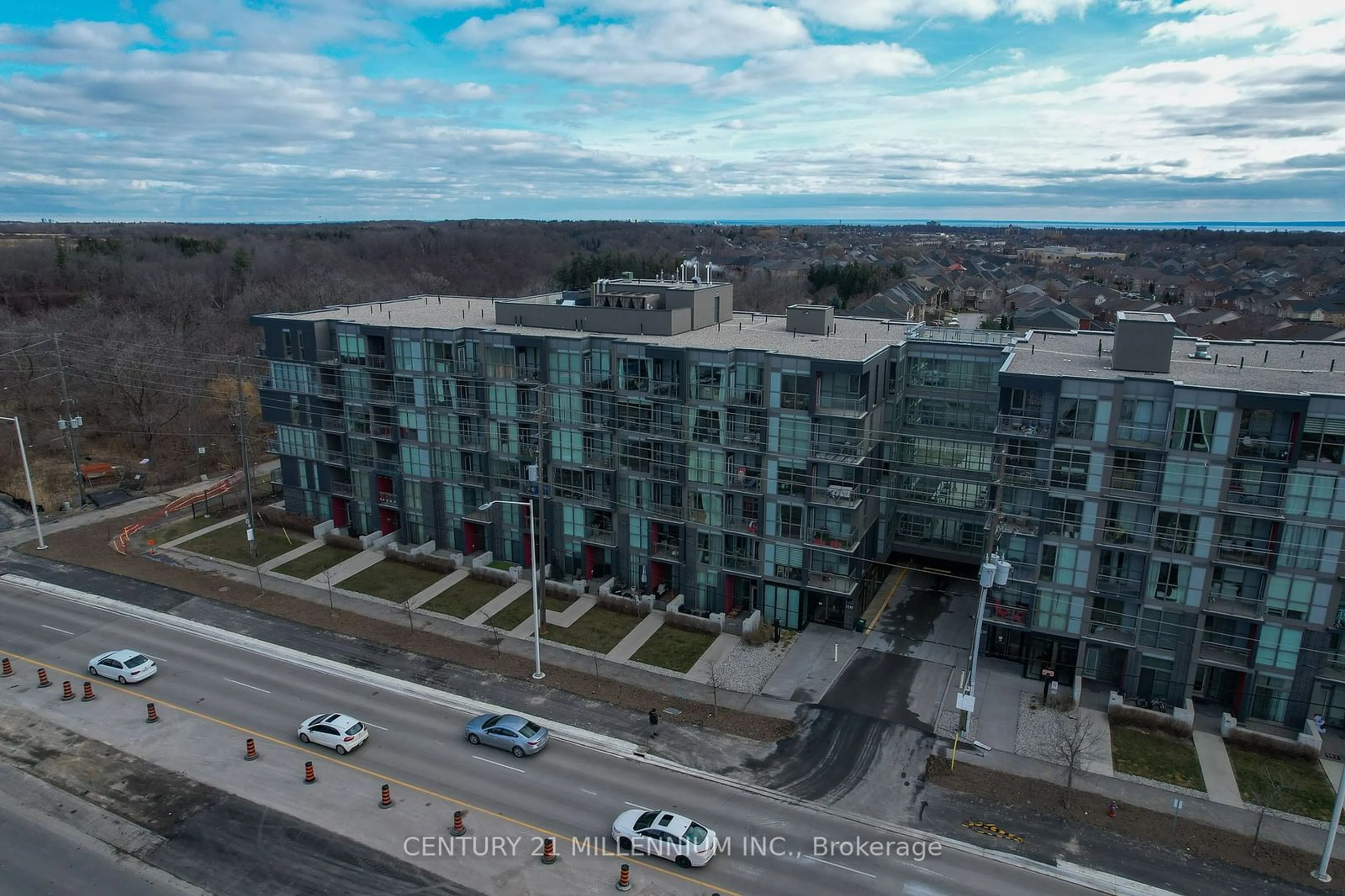 A pic from outside/outdoor area/front of a property/back of a property/a pic from drone, city buildings view from balcony for 5240 Dundas St #215, Burlington Ontario L7L 0J6