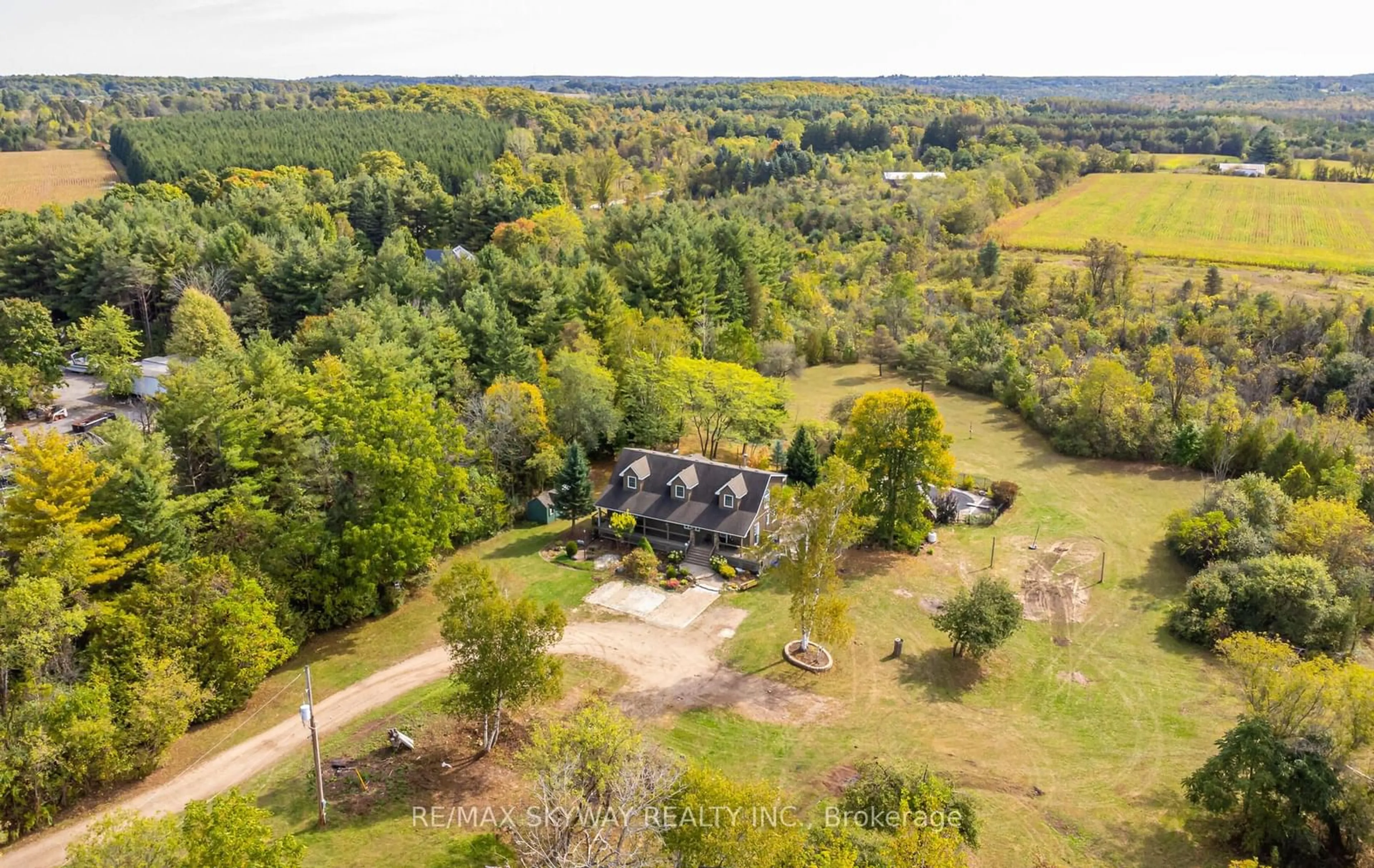 A pic from outside/outdoor area/front of a property/back of a property/a pic from drone, forest/trees view for 5628 HIGHWAY 7, Milton Ontario L7J 2L7