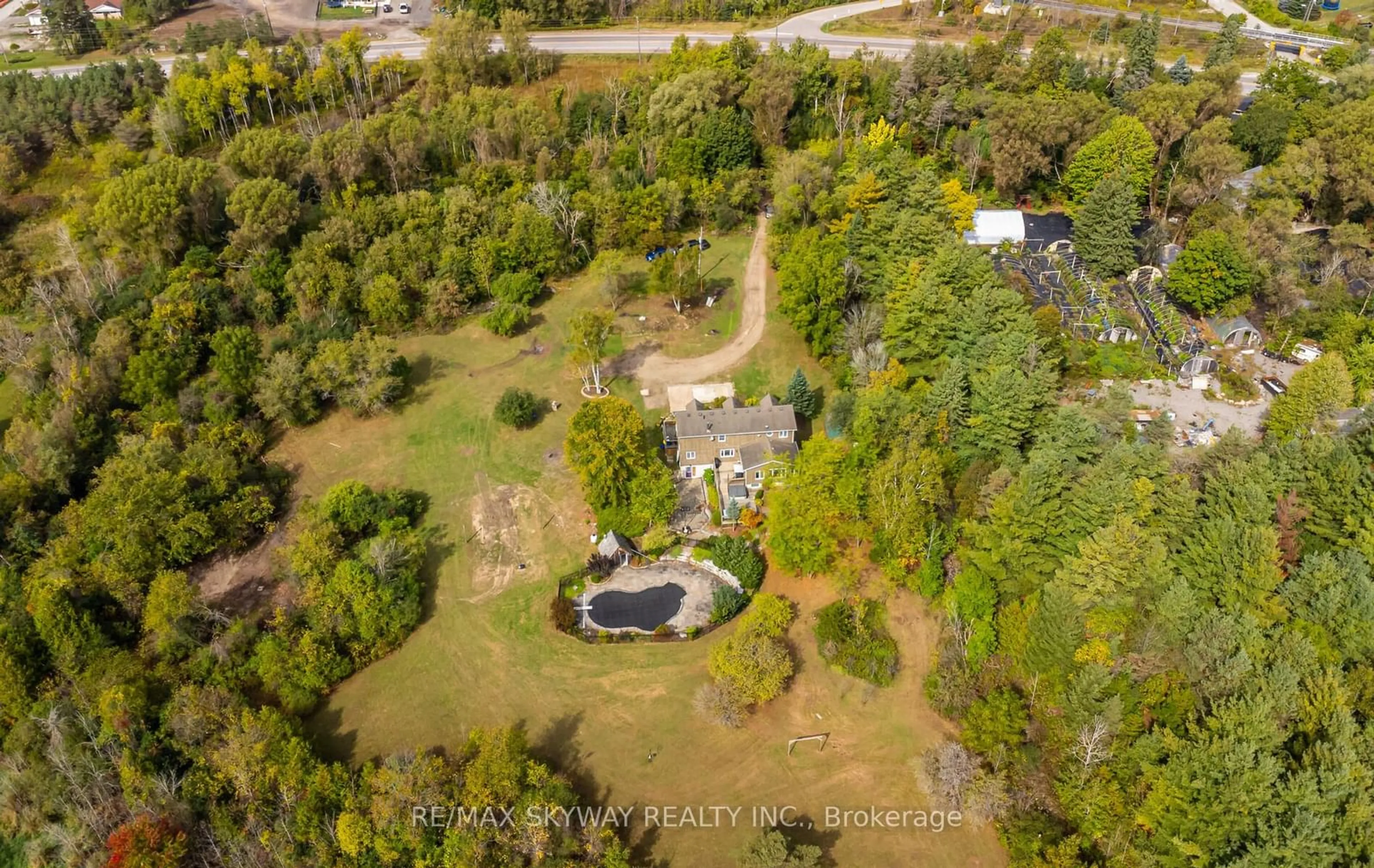 A pic from outside/outdoor area/front of a property/back of a property/a pic from drone, forest/trees view for 5628 HIGHWAY 7, Milton Ontario L7J 2L7