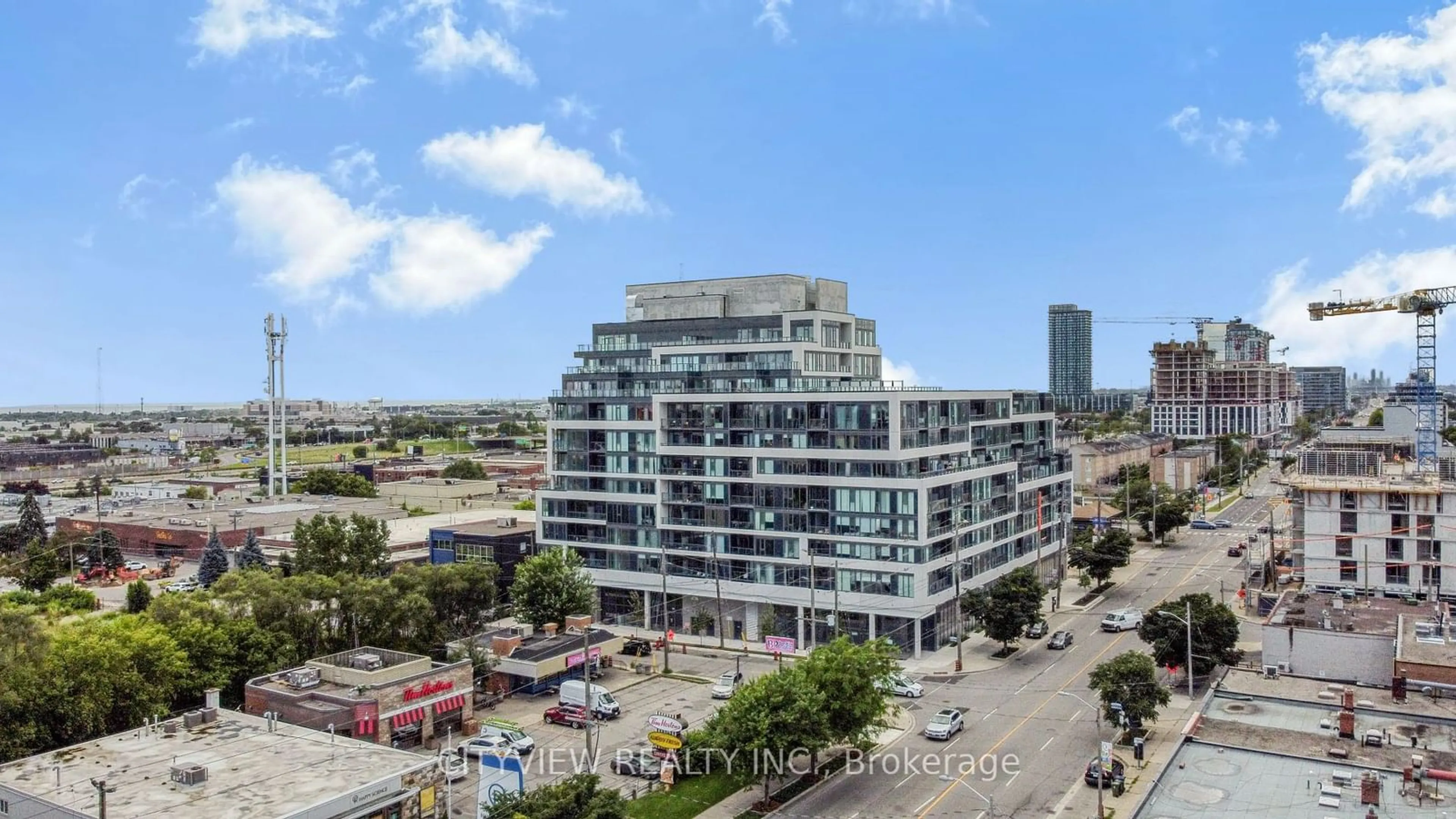 A pic from outside/outdoor area/front of a property/back of a property/a pic from drone, city buildings view from balcony for 859 The Queensway #816, Toronto Ontario M8Z 1N8