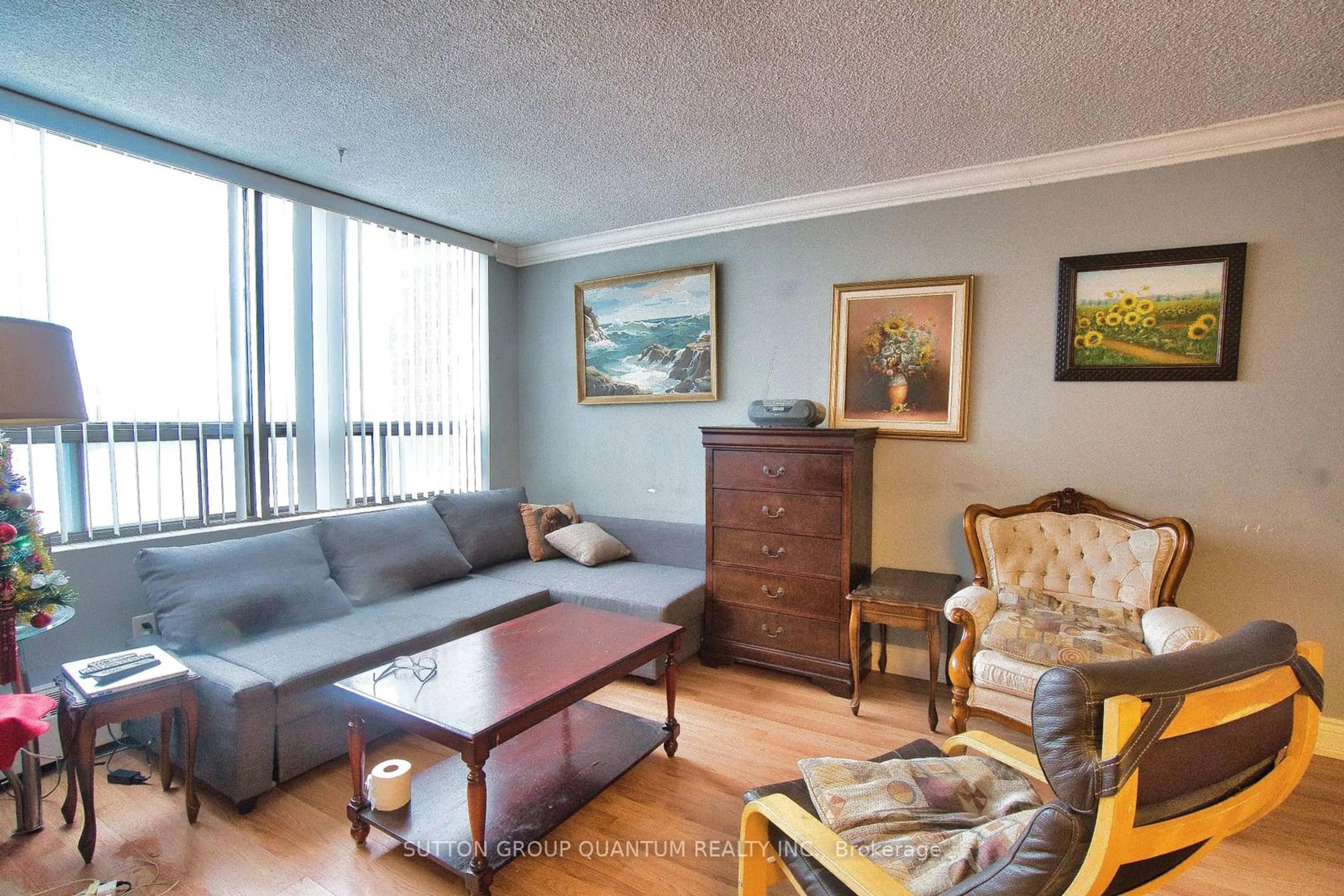 Living room with furniture, wood/laminate floor for 2542 Argyle Rd #705, Mississauga Ontario L5B 2H5