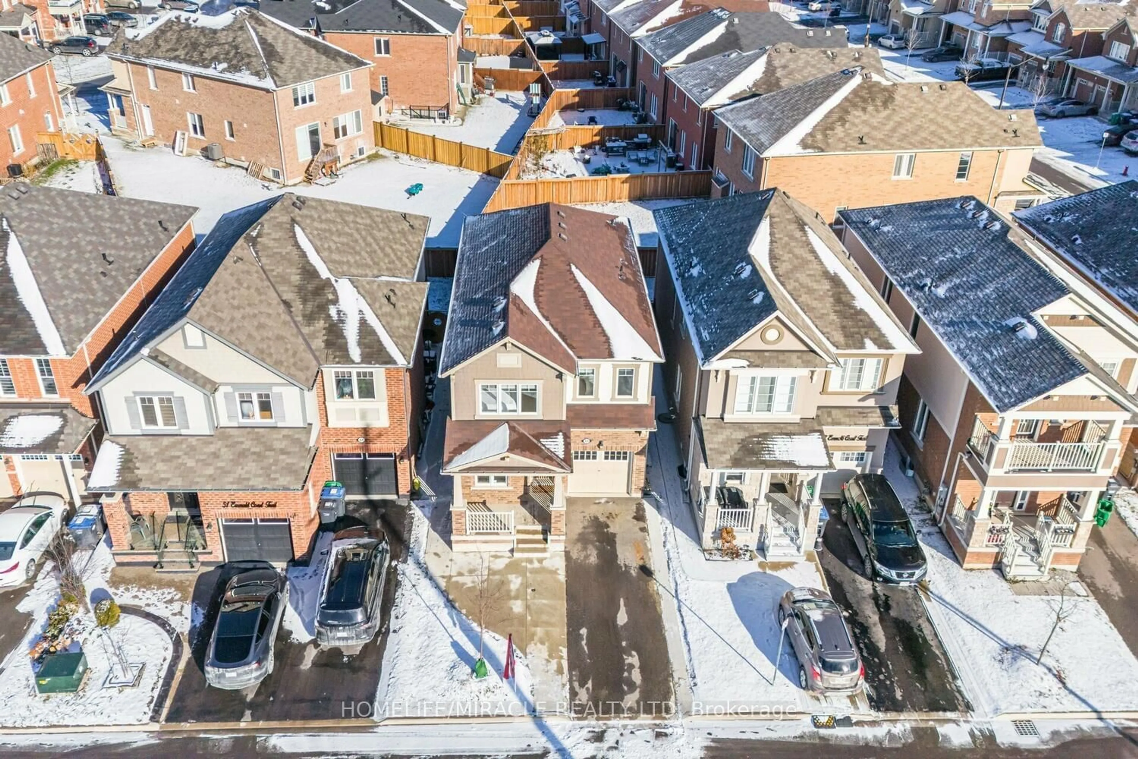 A pic from outside/outdoor area/front of a property/back of a property/a pic from drone, street for 49 Emerald Coast Tr, Brampton Ontario L7A 5A7