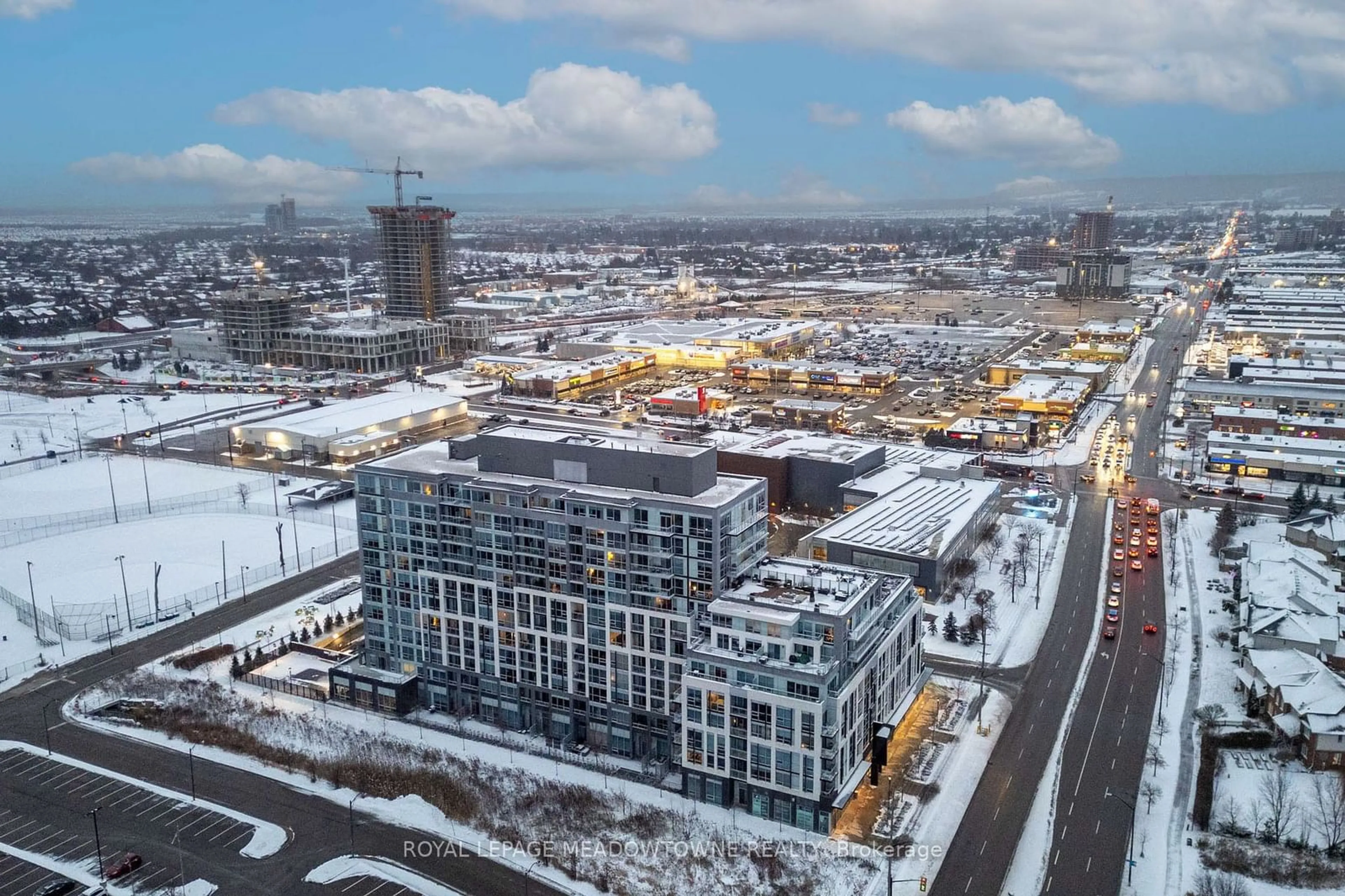 A pic from outside/outdoor area/front of a property/back of a property/a pic from drone, city buildings view from balcony for 1050 Main St #809, Milton Ontario L9T 9M3