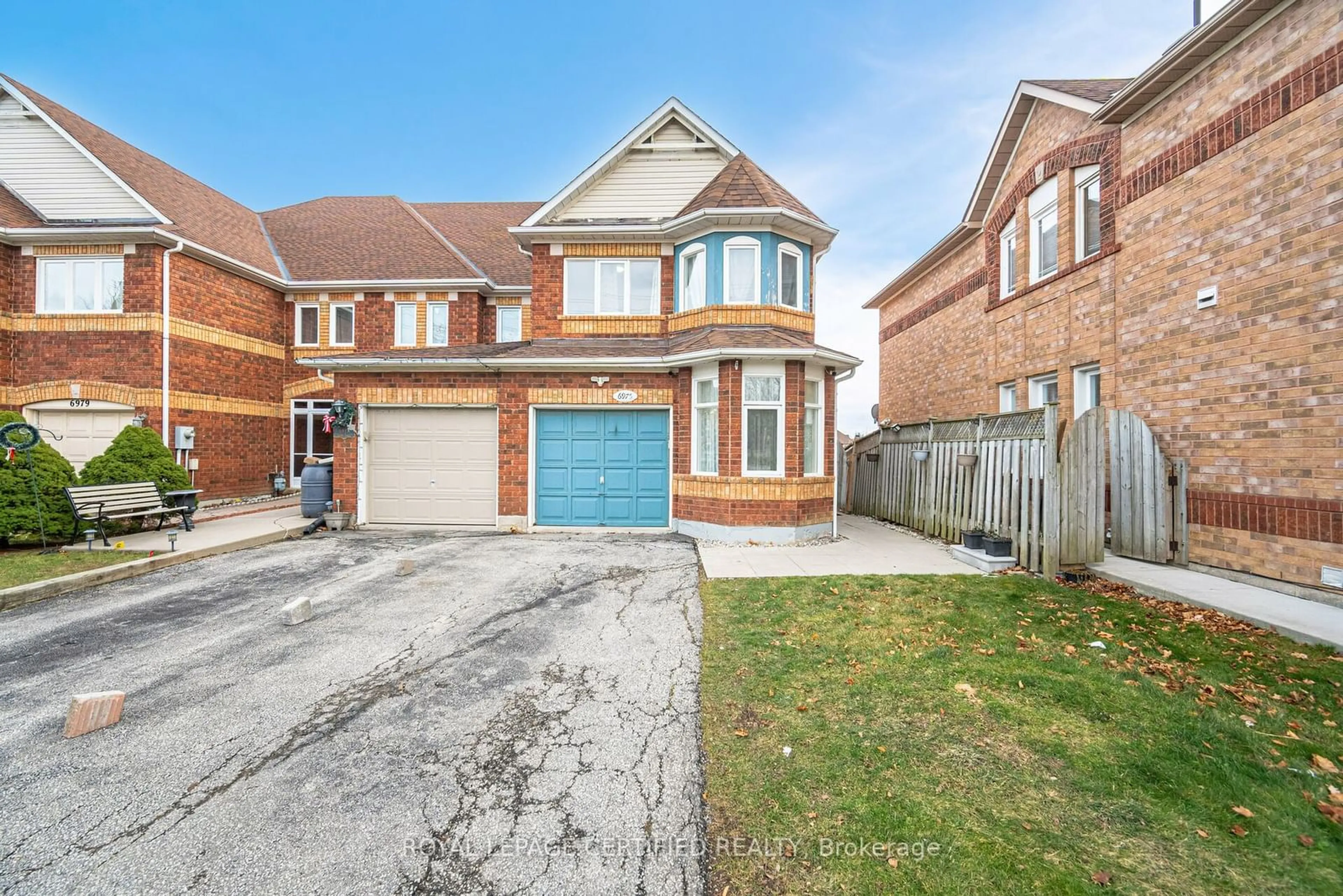 Home with brick exterior material, street for 6975 Glory Crt, Mississauga Ontario L5N 7E2