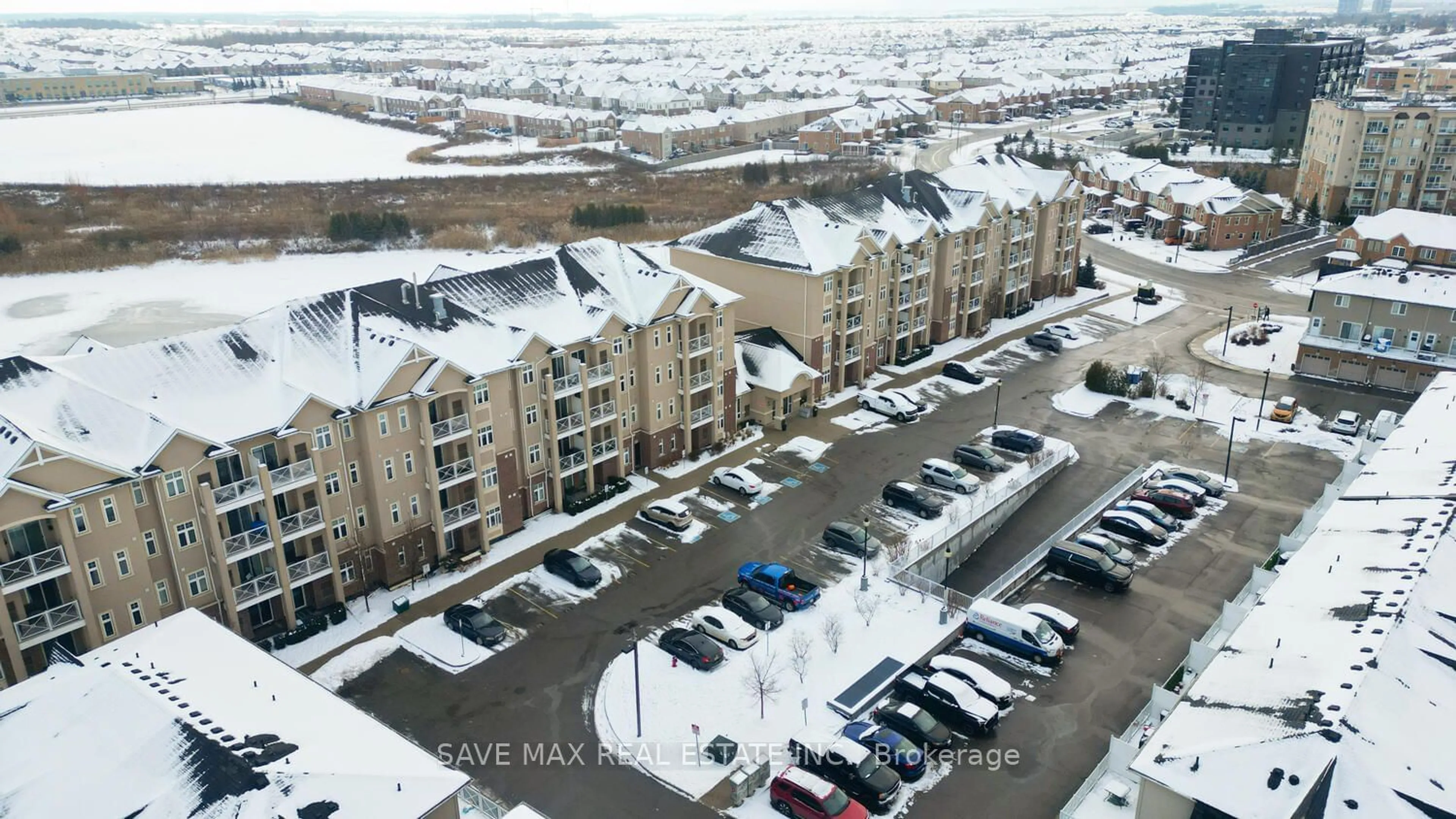 A pic from outside/outdoor area/front of a property/back of a property/a pic from drone, city buildings view from balcony for 1360 Costigan Rd #105, Milton Ontario L9T 0Y8