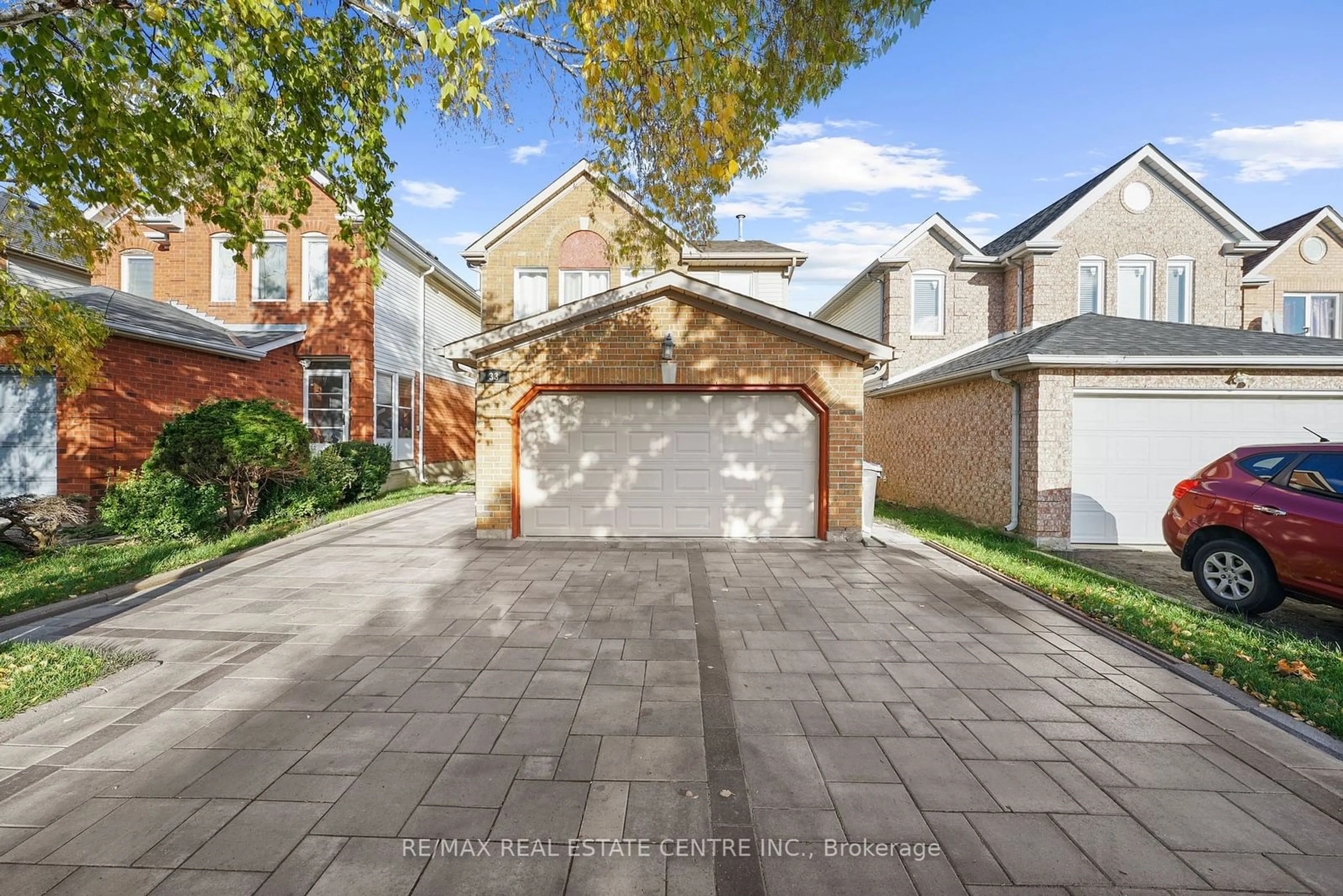 Home with brick exterior material, street for 33 Trammell Lane, Brampton Ontario L6Y 4J3