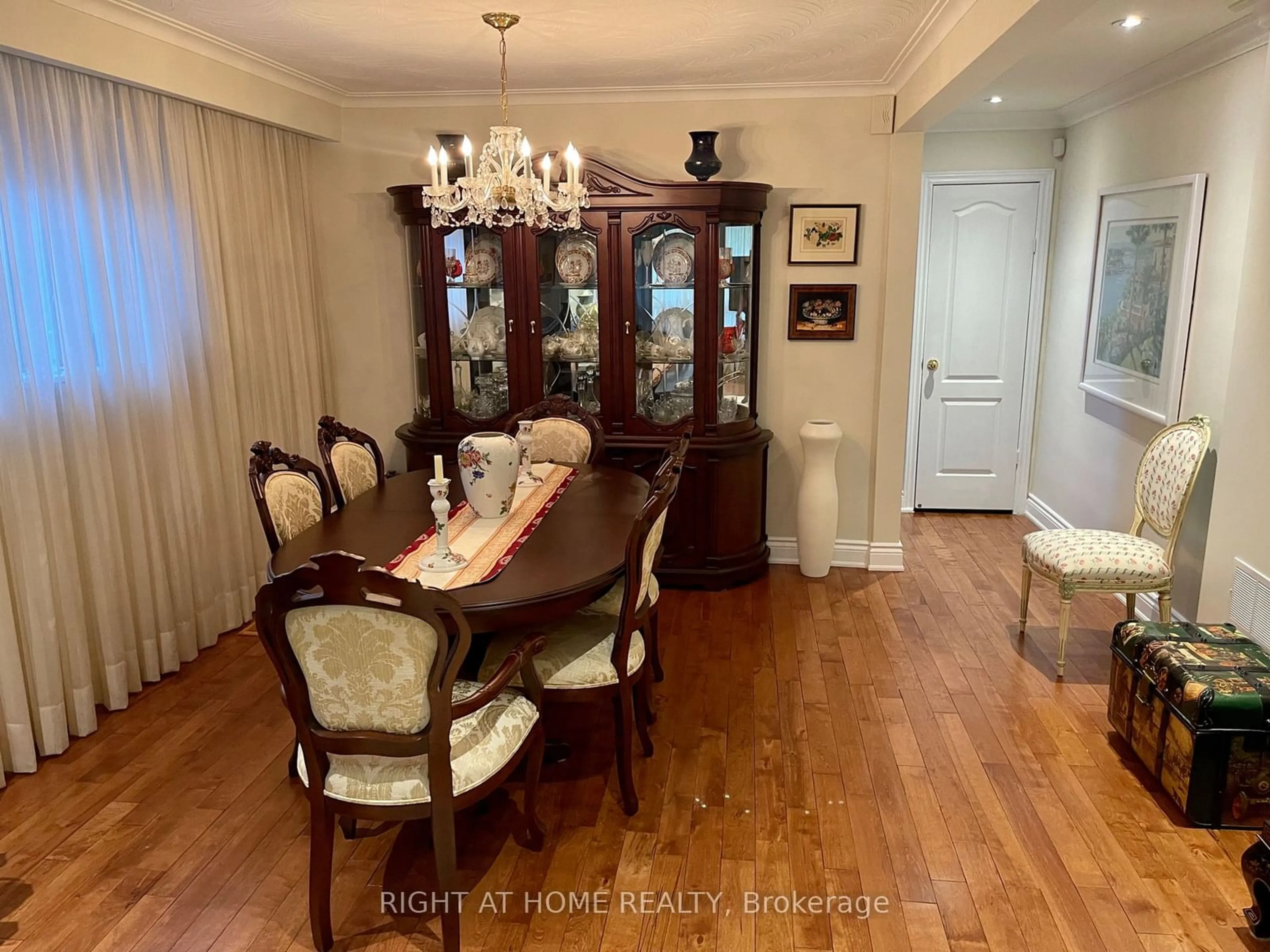 Dining room, wood/laminate floor for 68 Caledonia Rd, Toronto Ontario M6E 4S6