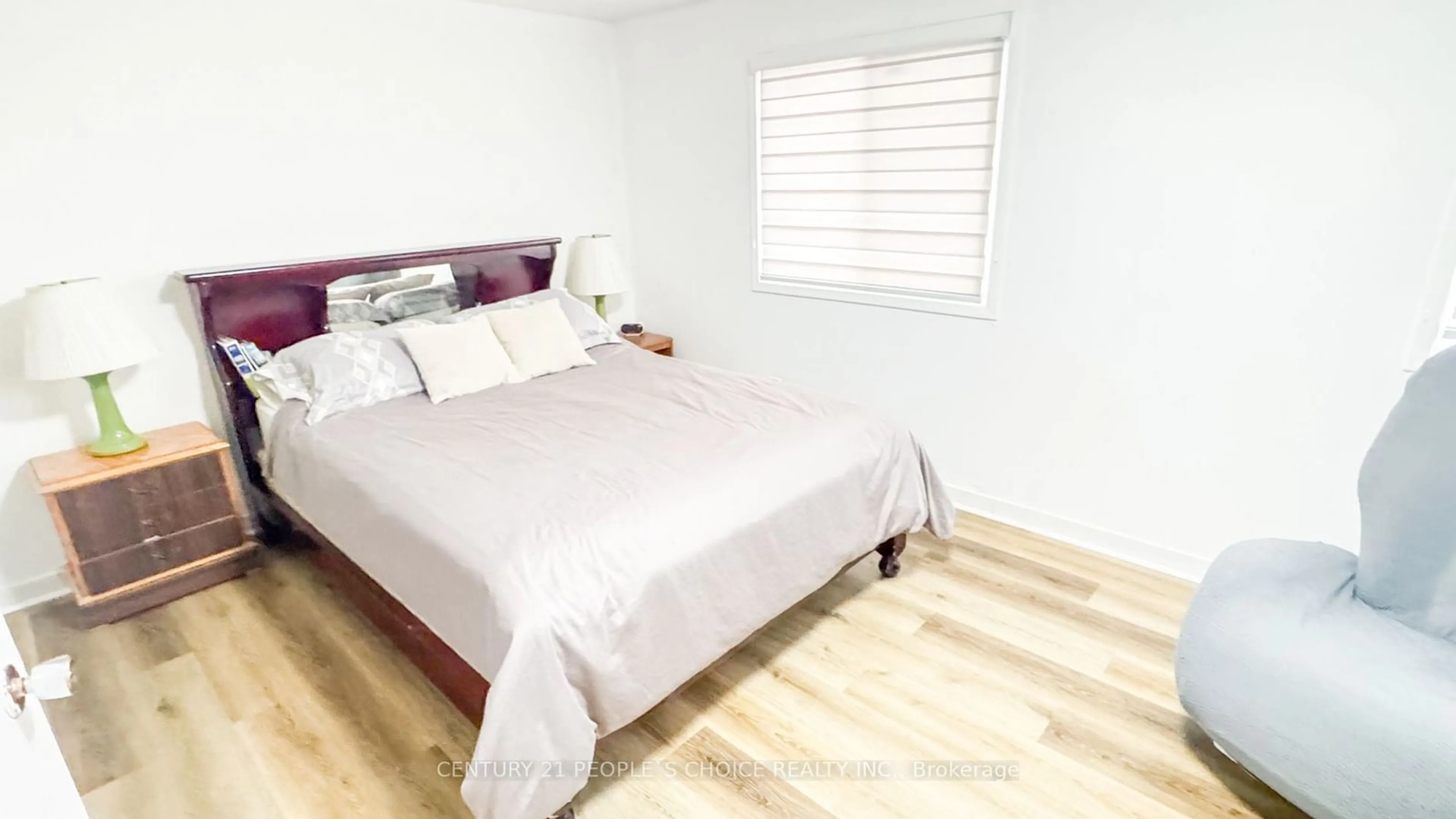 Bedroom with bed, wood/laminate floor for 16 Hedley Crt, Brampton Ontario L6S 2B6