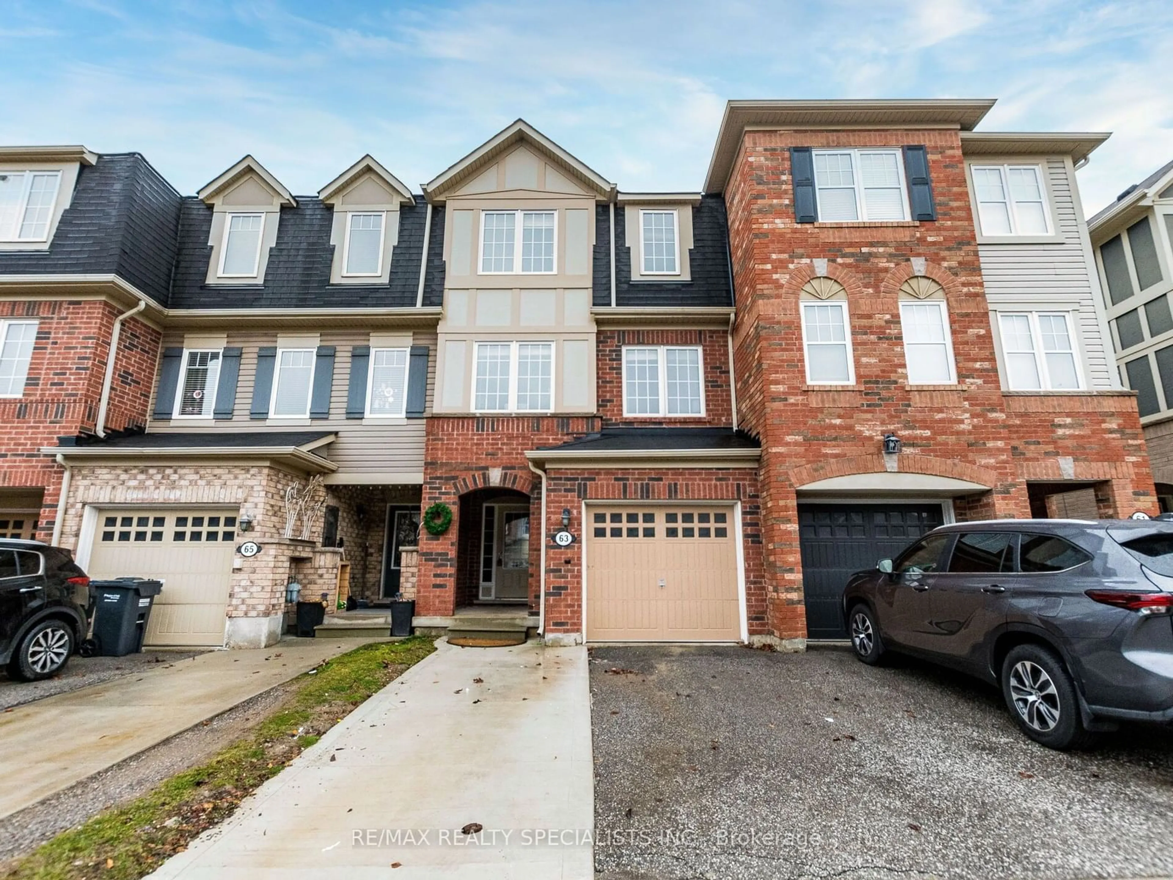 Home with brick exterior material, street for 63 Betterton Cres, Brampton Ontario L7A 0S4