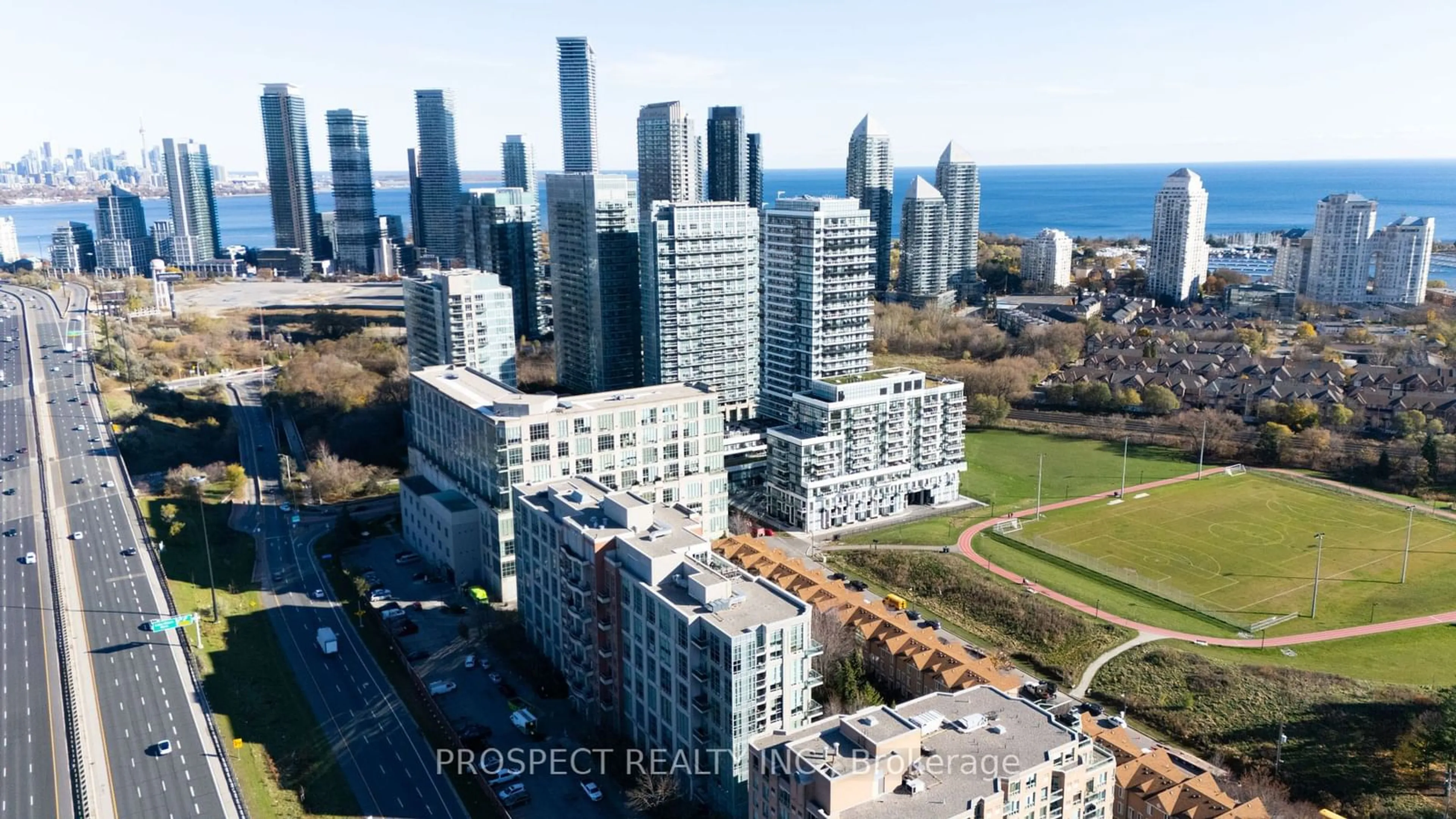 A pic from outside/outdoor area/front of a property/back of a property/a pic from drone, city buildings view from balcony for 200 Manitoba St #301, Toronto Ontario M8Y 3Y9