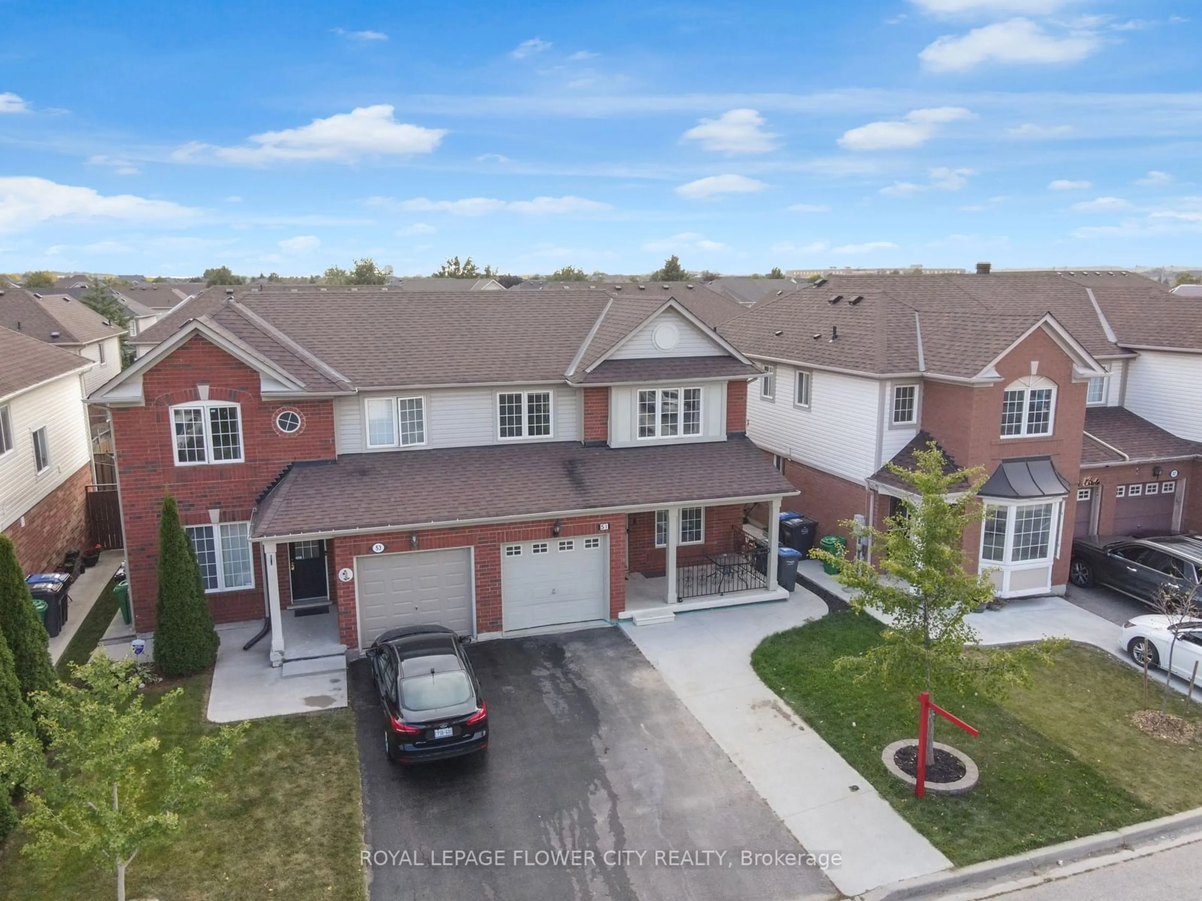 A pic from outside/outdoor area/front of a property/back of a property/a pic from drone, street for 51 Sweetwood Circ, Brampton Ontario L7A 2X7