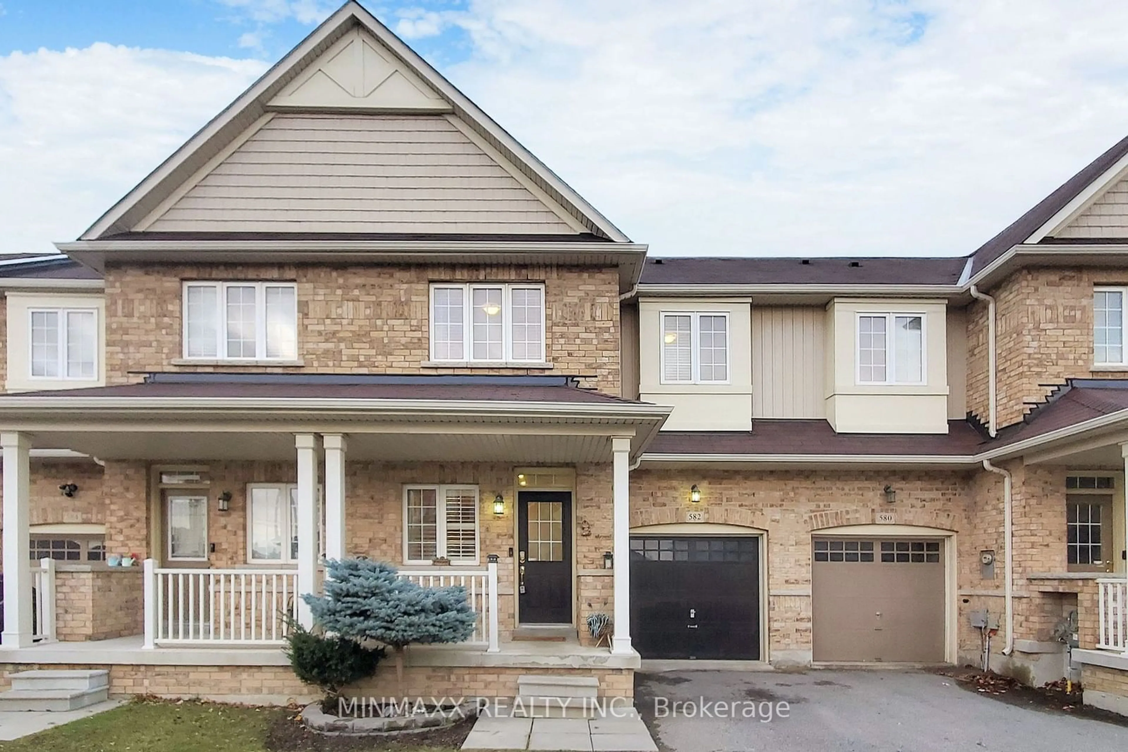 Home with brick exterior material, street for 582 Murray Meadows Pl, Milton Ontario L9T 8L7