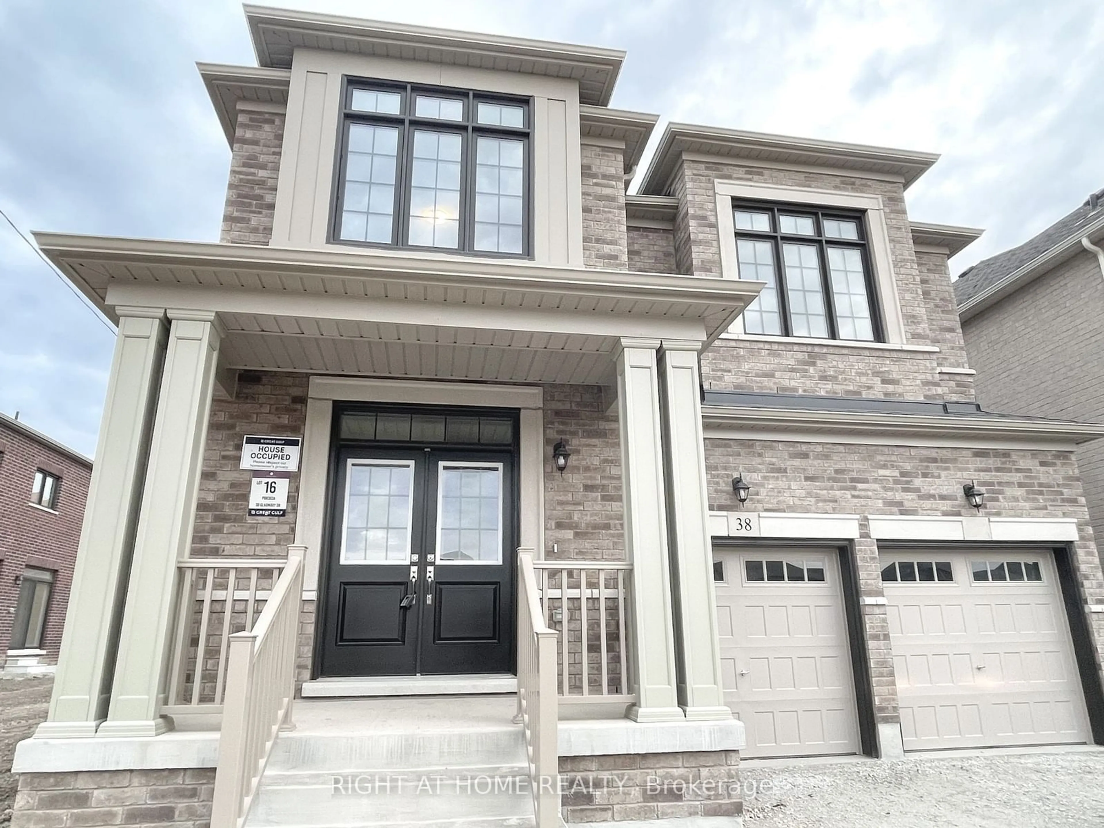 Home with brick exterior material, street for 38 Gladmary Dr, Brampton Ontario L6Y 6K9