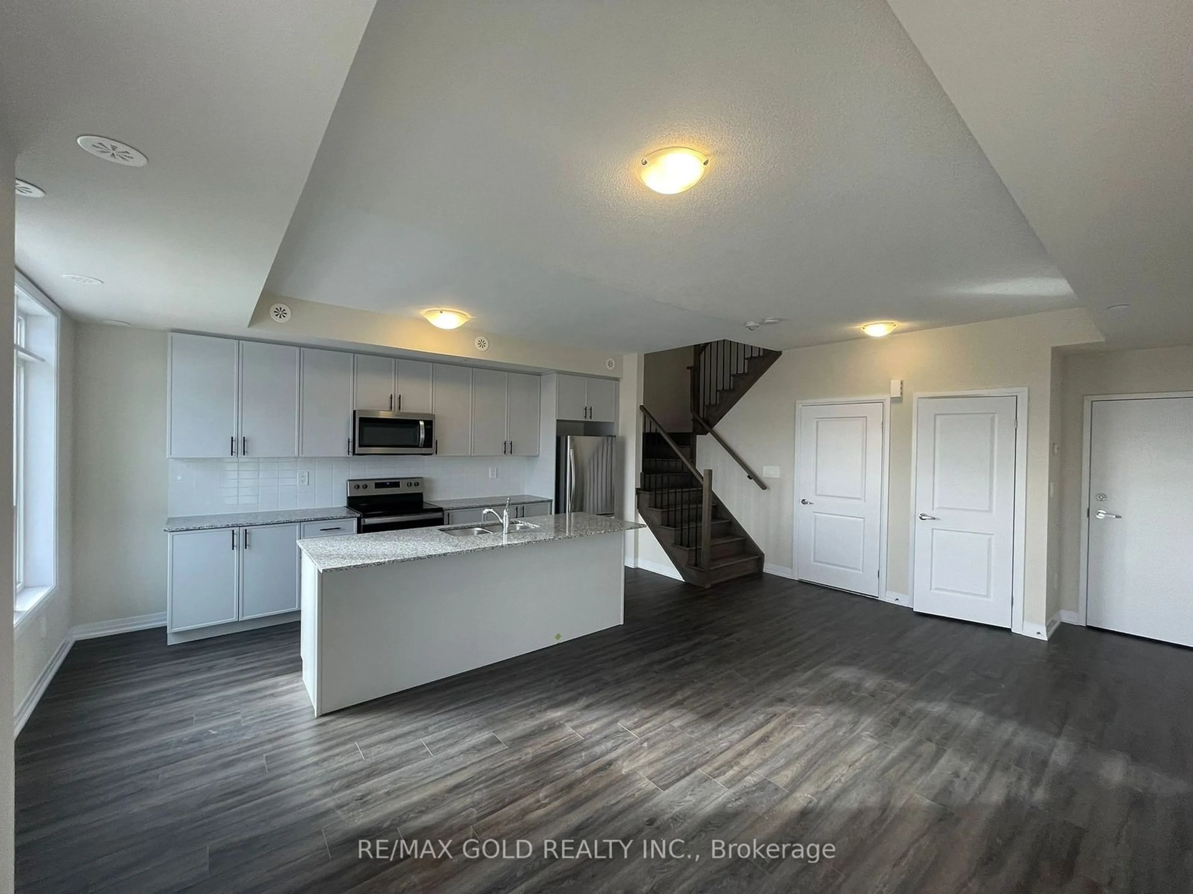 Open concept kitchen, unknown for 1581 Rose Way #414, Milton Ontario L9E 1N4